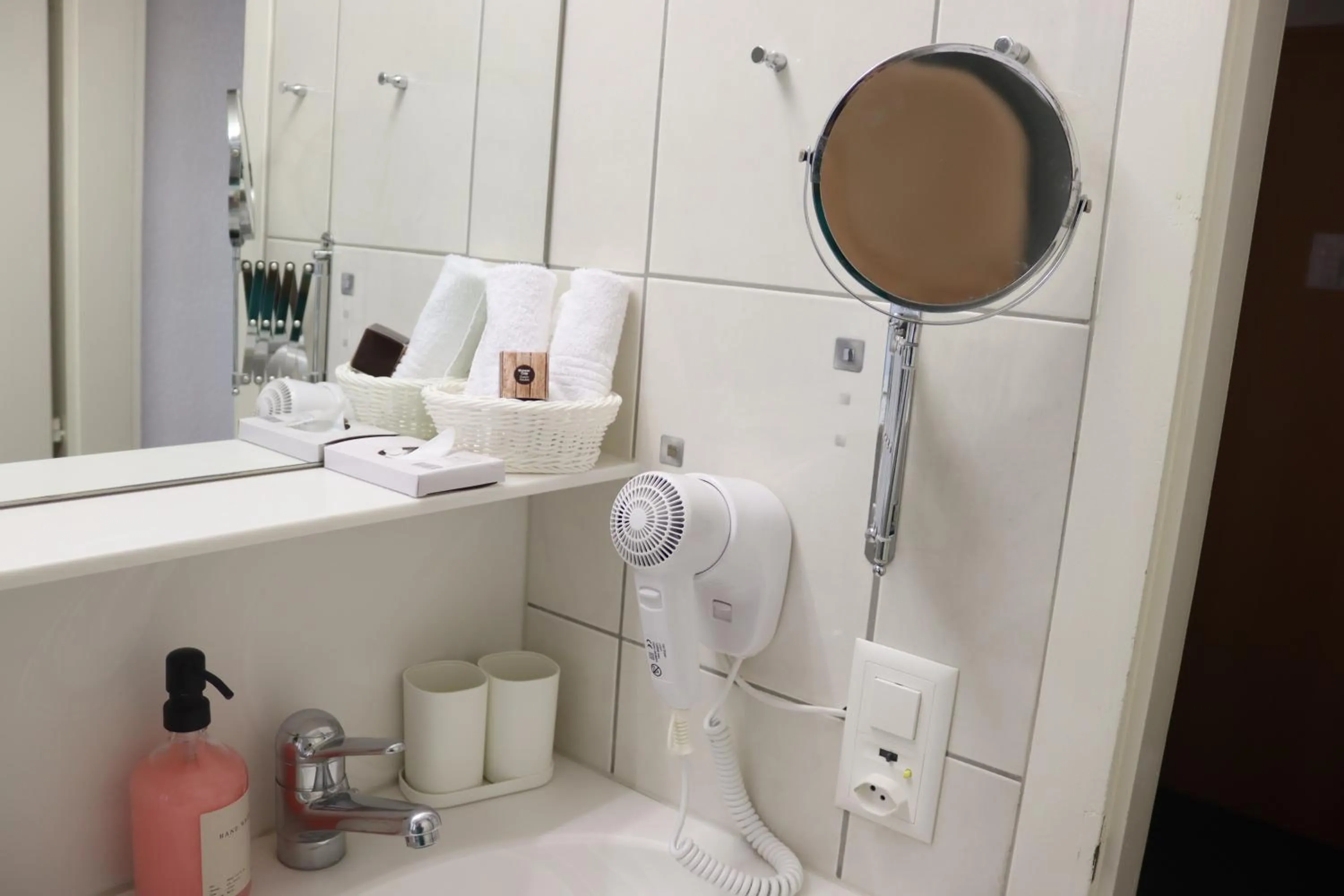 Bathroom in Grichting Hotel & Serviced Apartments