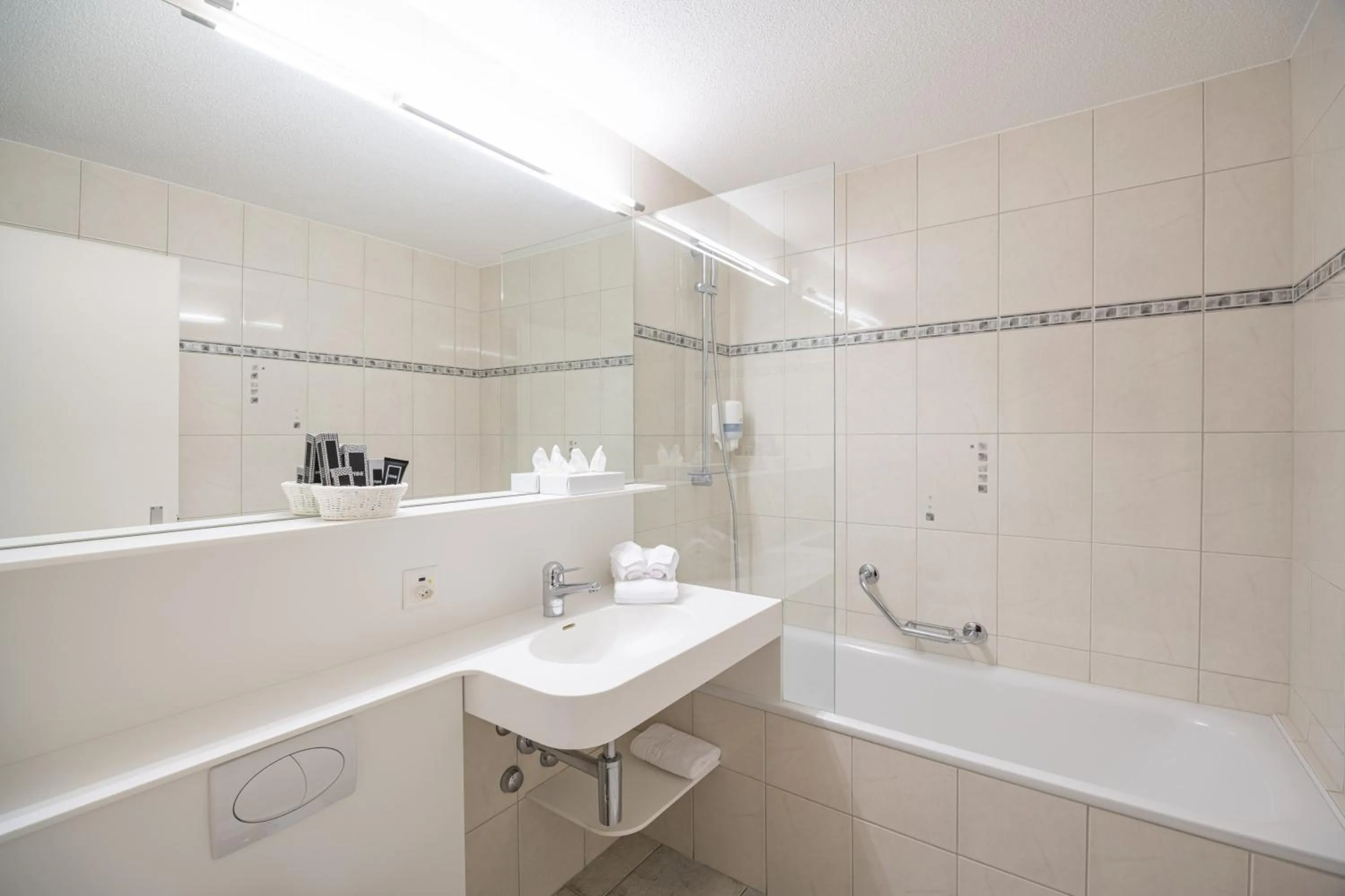 Bathroom in Grichting Hotel & Serviced Apartments