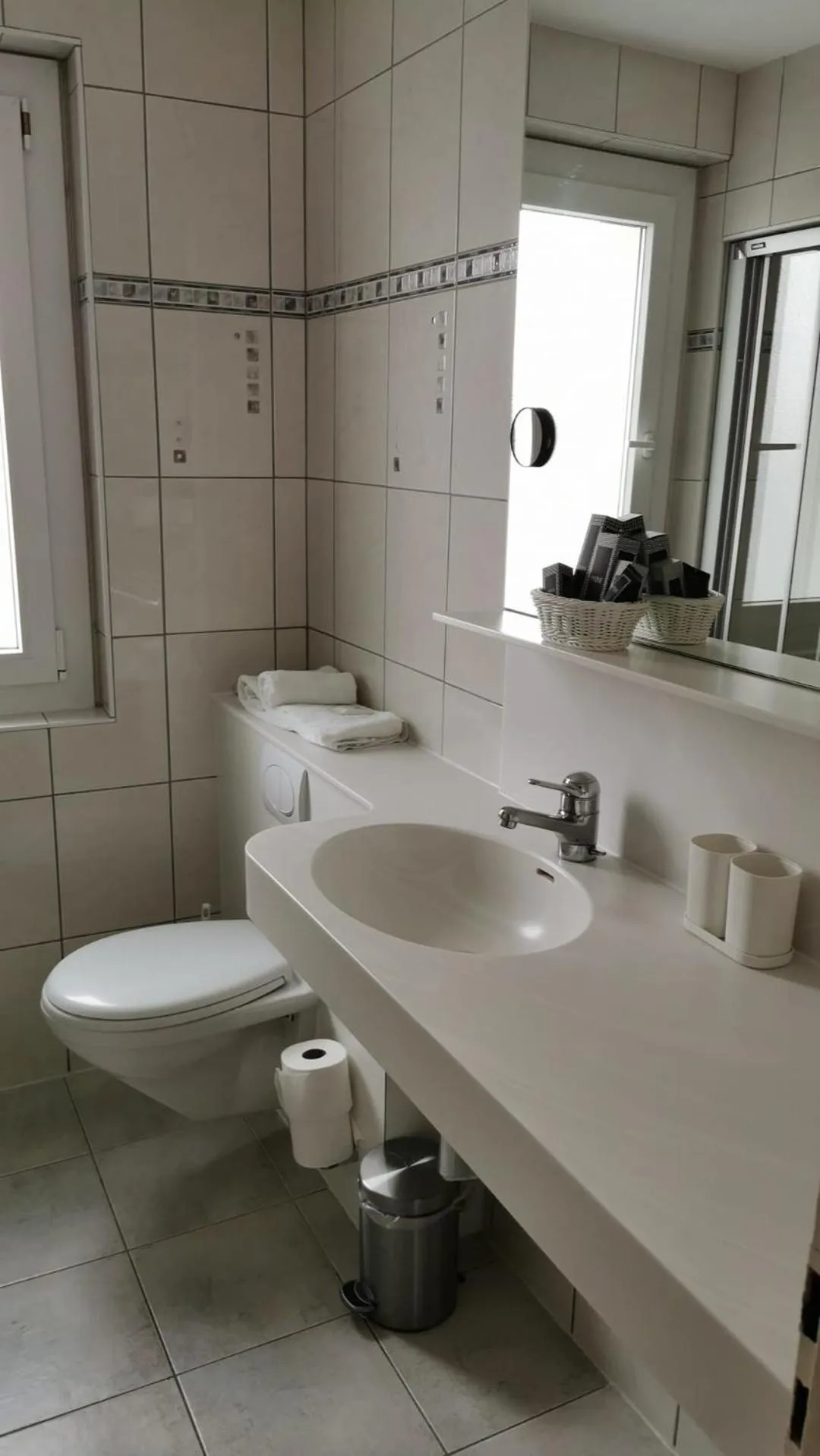 Toilet in Grichting Hotel & Serviced Apartments