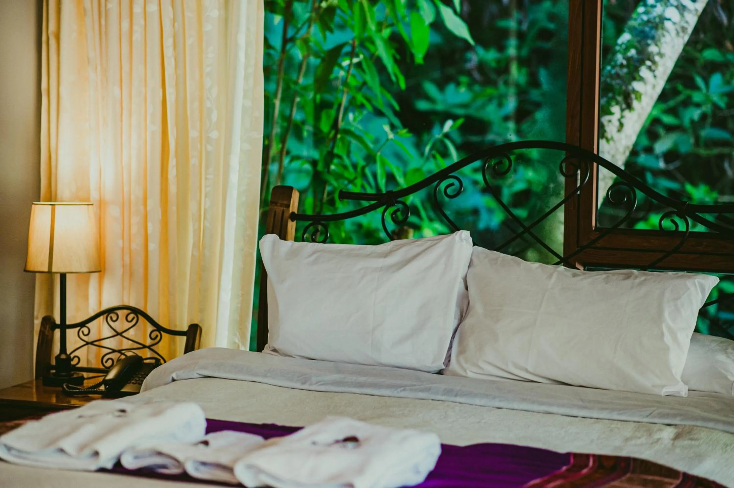 Bed in Rupa Rupa High Jungle Eco B&B