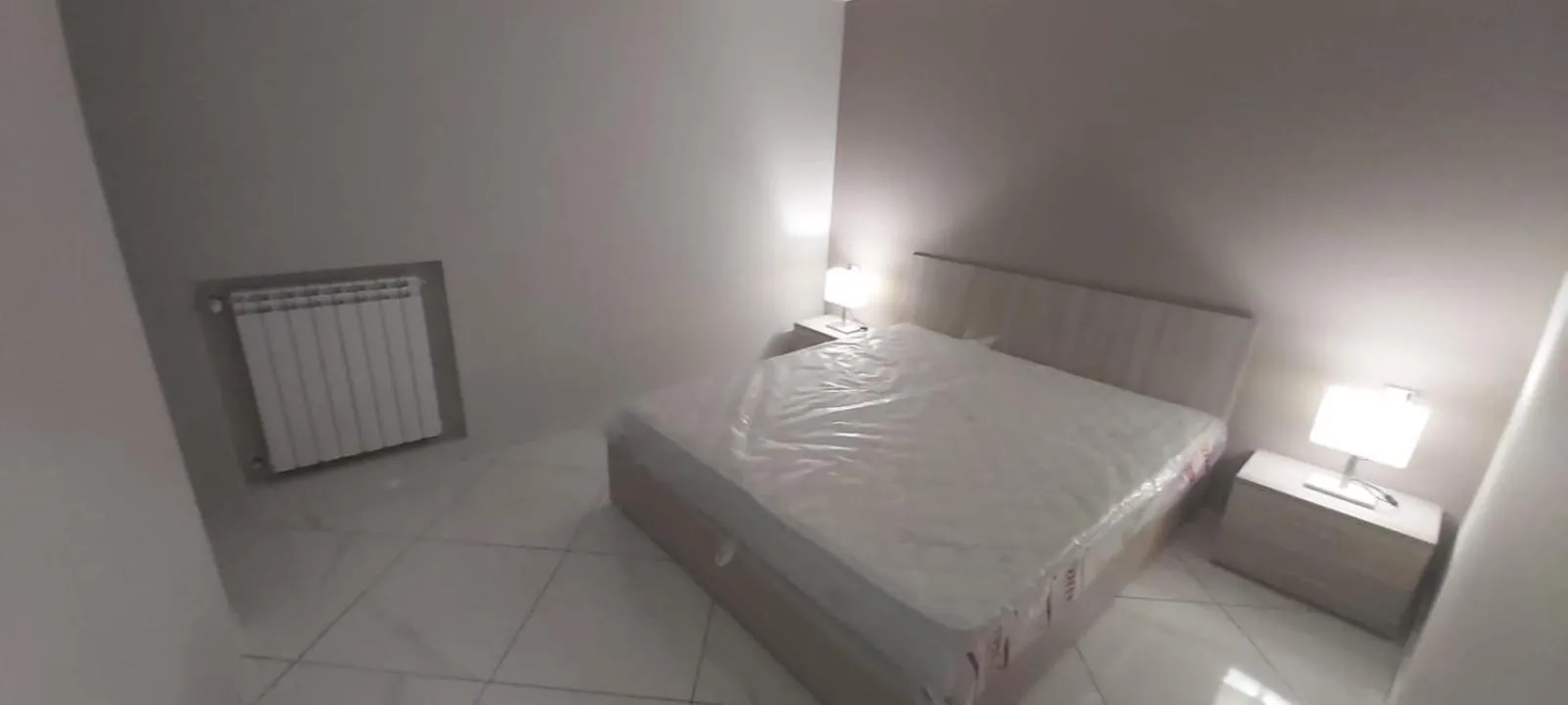 Bed in Mignone Luxury House