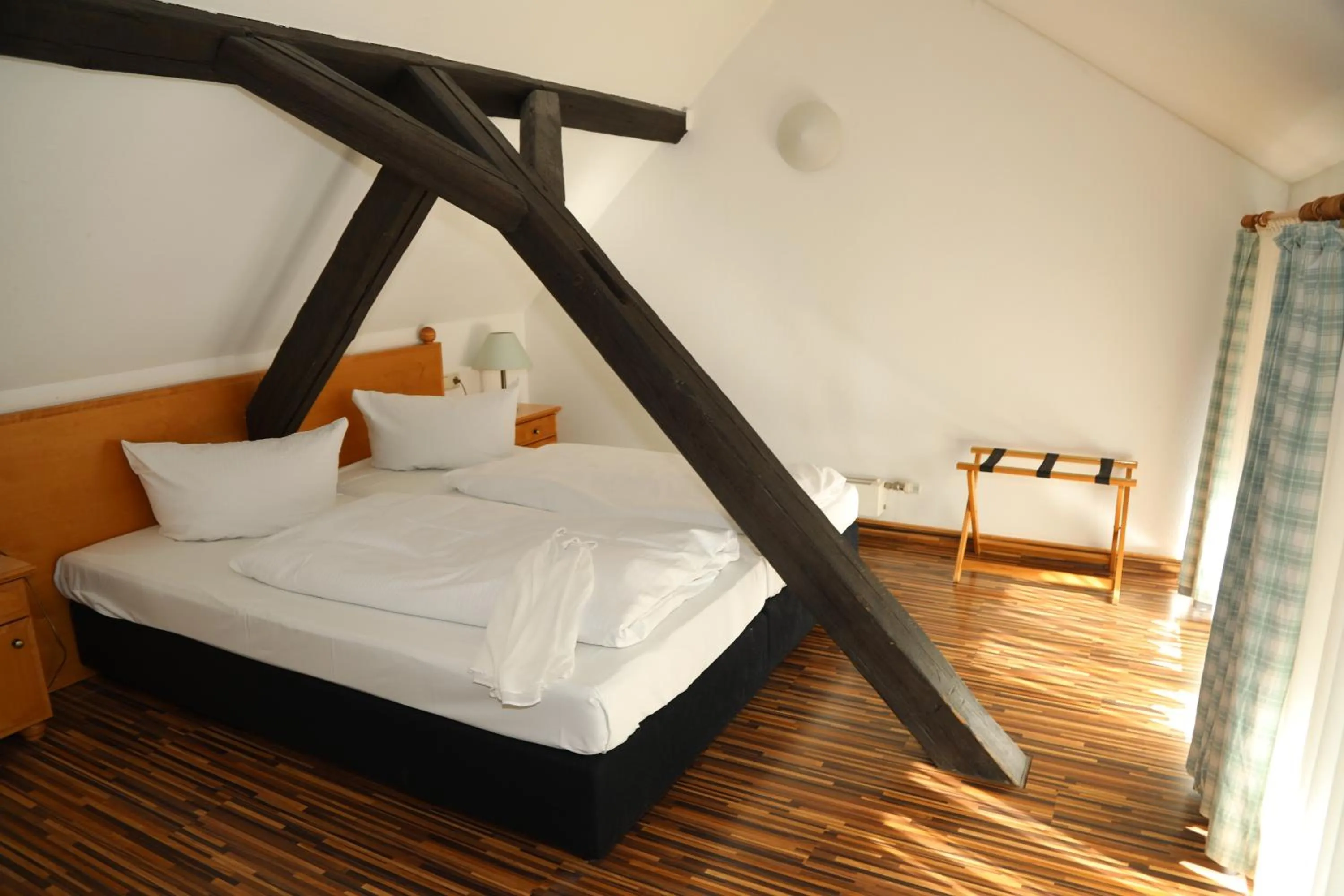 Photo of the whole room, Bed in Hotel Goldener Adler Garni