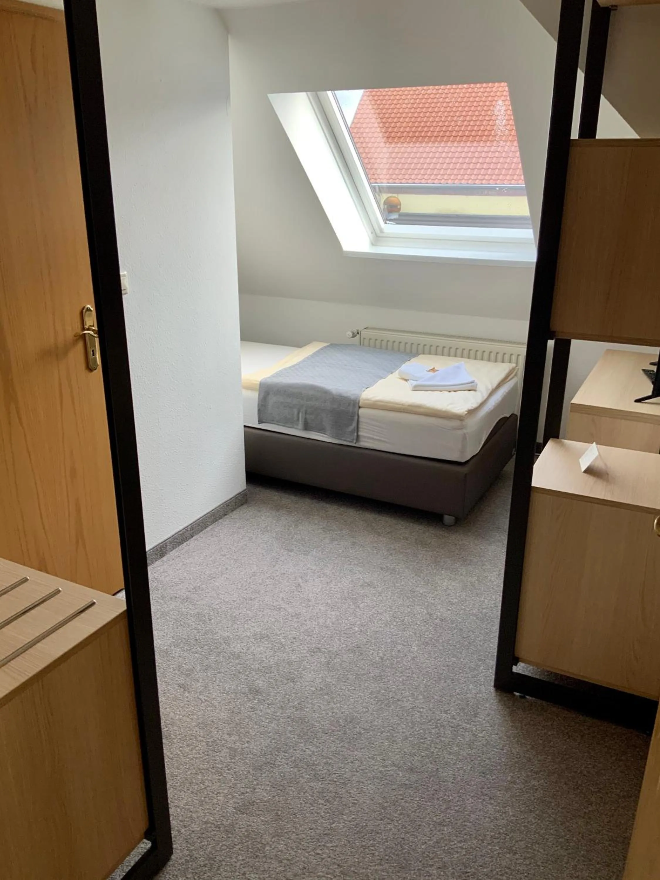 Photo of the whole room, Bed in Bluhm's Hotel & Restaurant am Markt