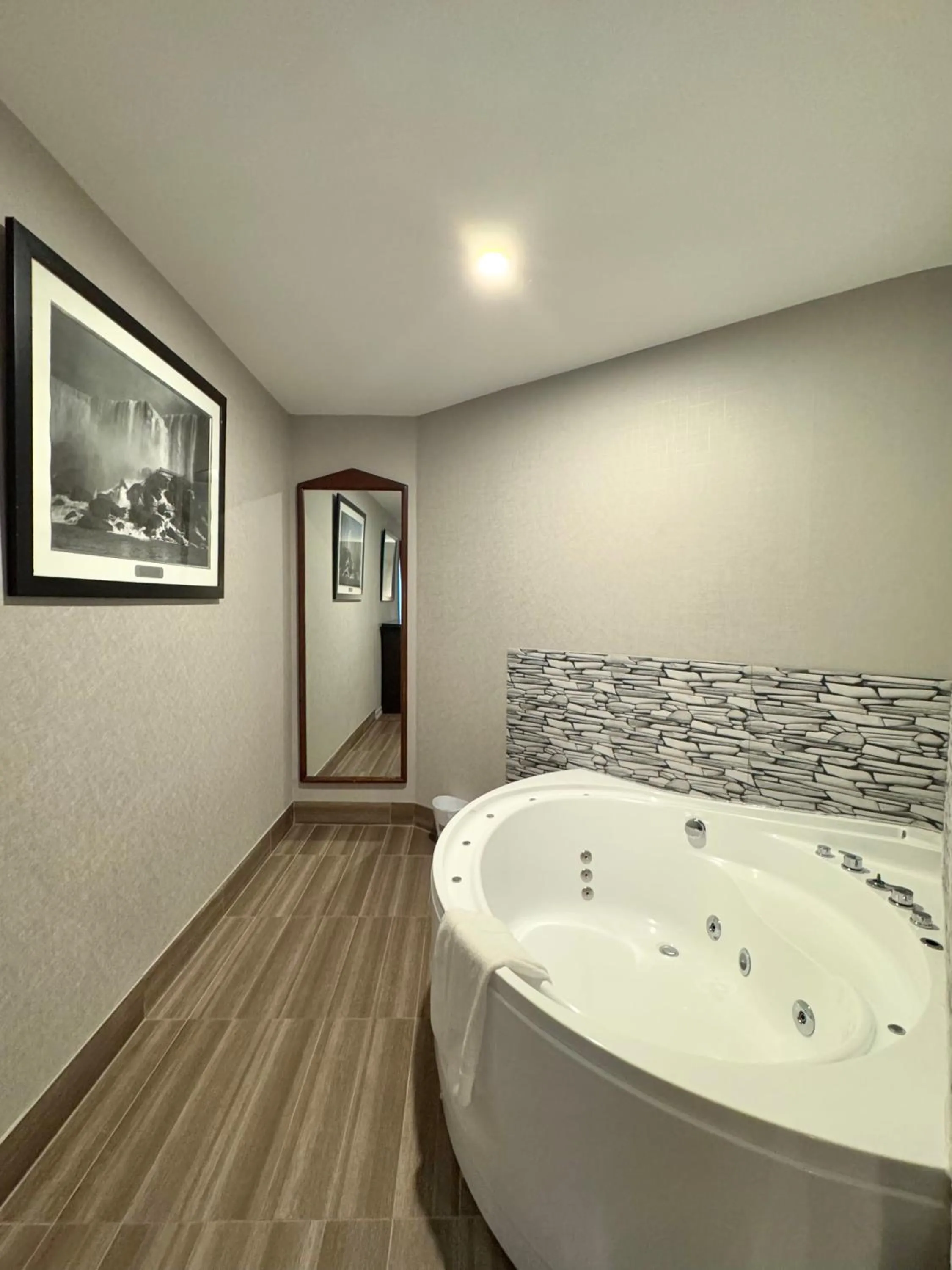 Bathroom in Big Bird Inn Wawa, SureStay Collection by Best Western