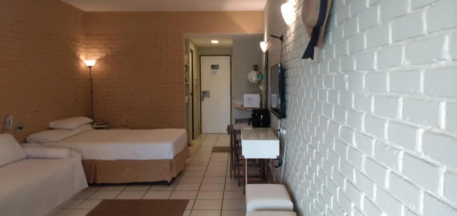 Bed in Angra dos Reis Flat Suíte no Portogalo