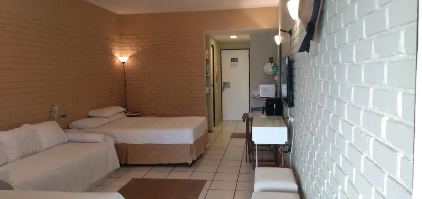 Bed in Angra dos Reis Flat Suíte no Portogalo