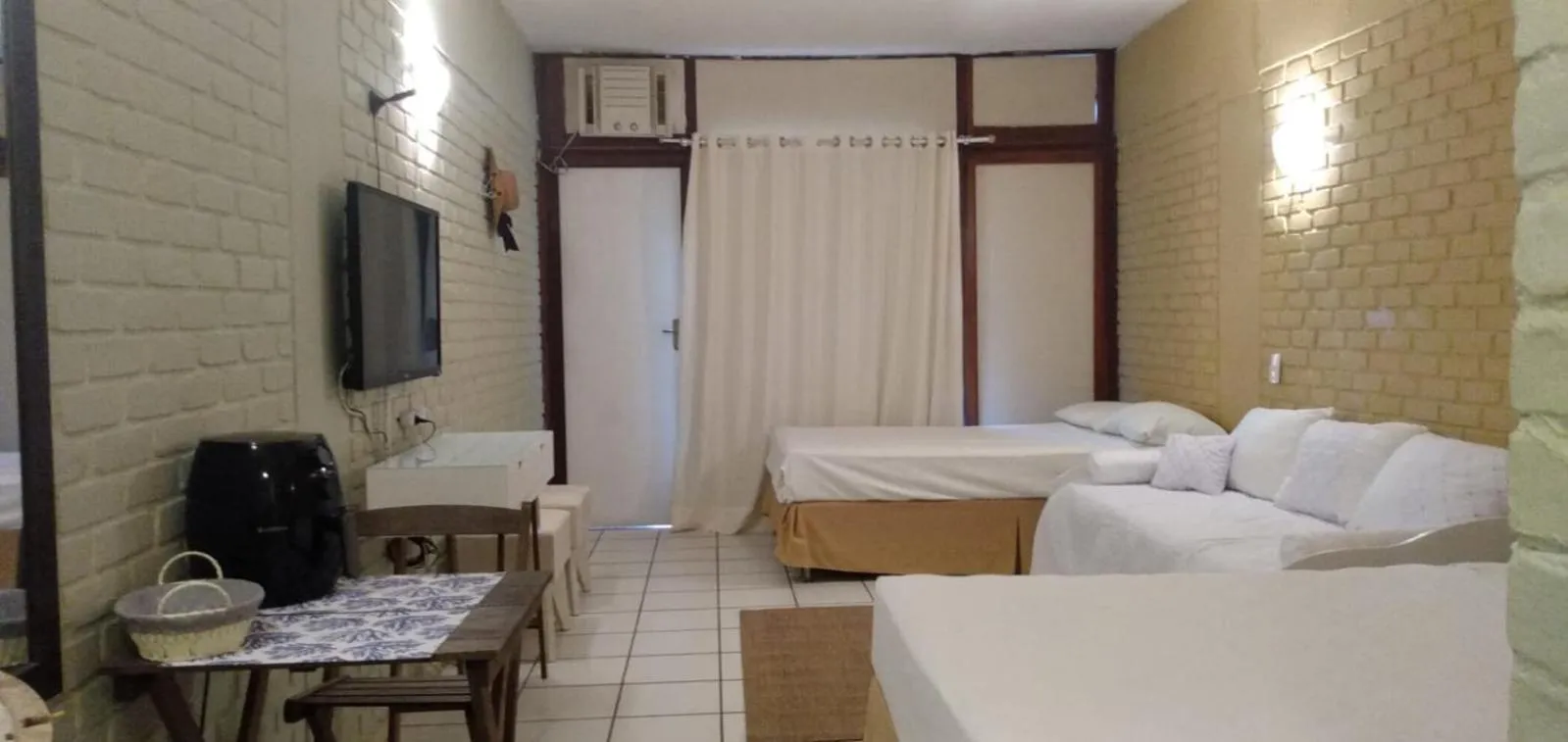 Bed in Angra dos Reis Flat Suíte no Portogalo