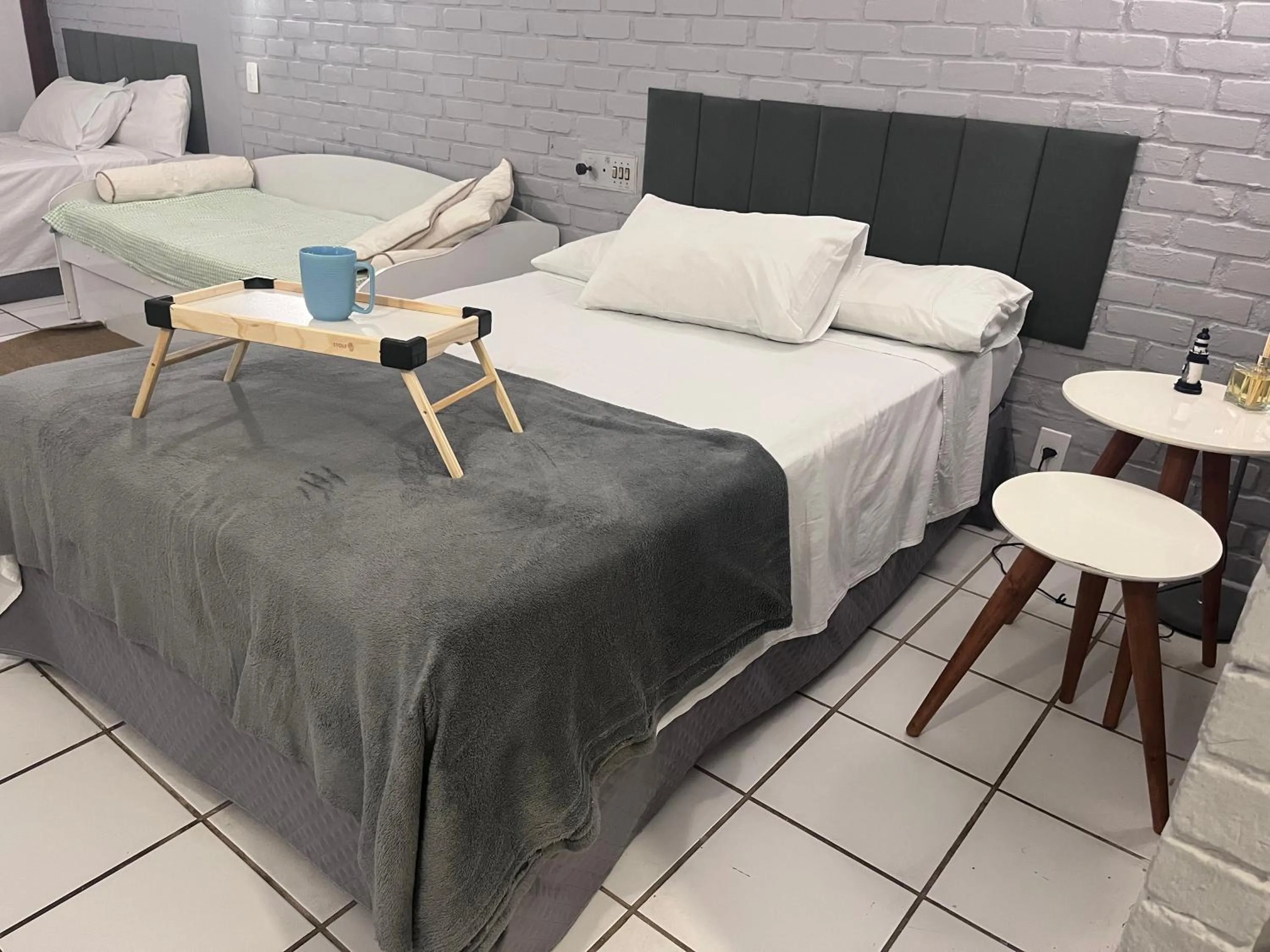 Bed in Angra dos Reis Flat Suíte no Portogalo