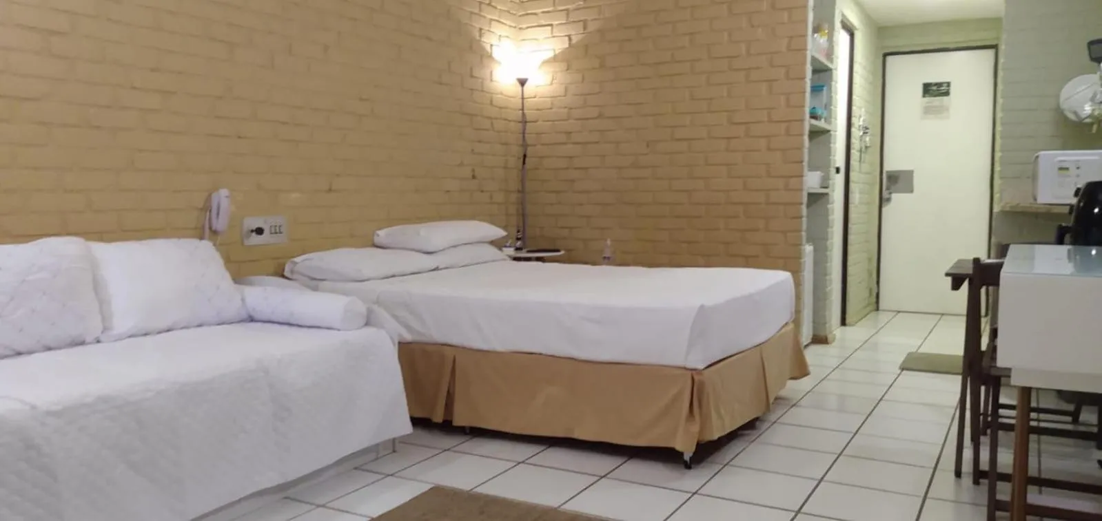 Bed in Angra dos Reis Flat Suíte no Portogalo