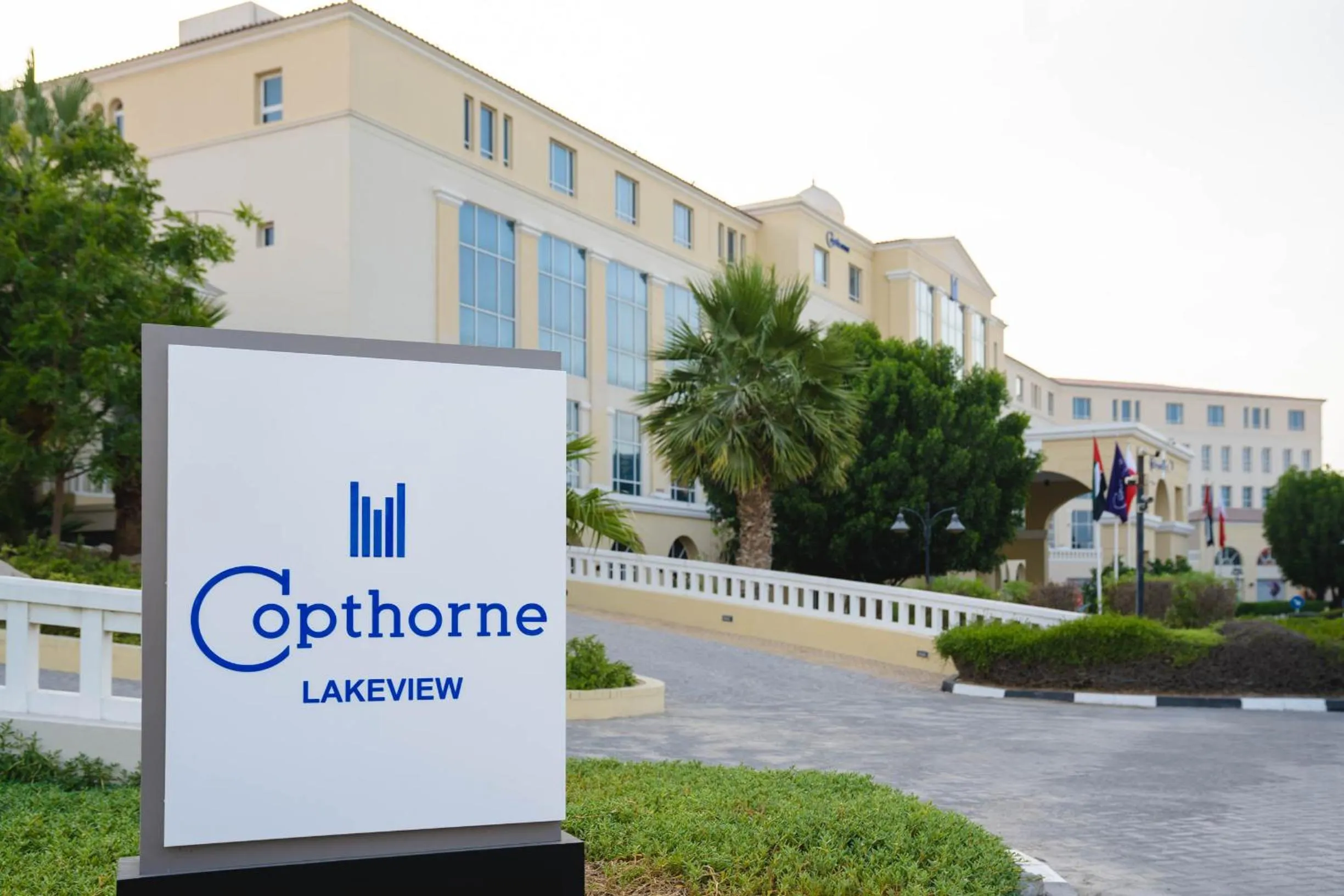 Property logo or sign in Copthorne Lakeview Executive Apartments Dubai, Green Community