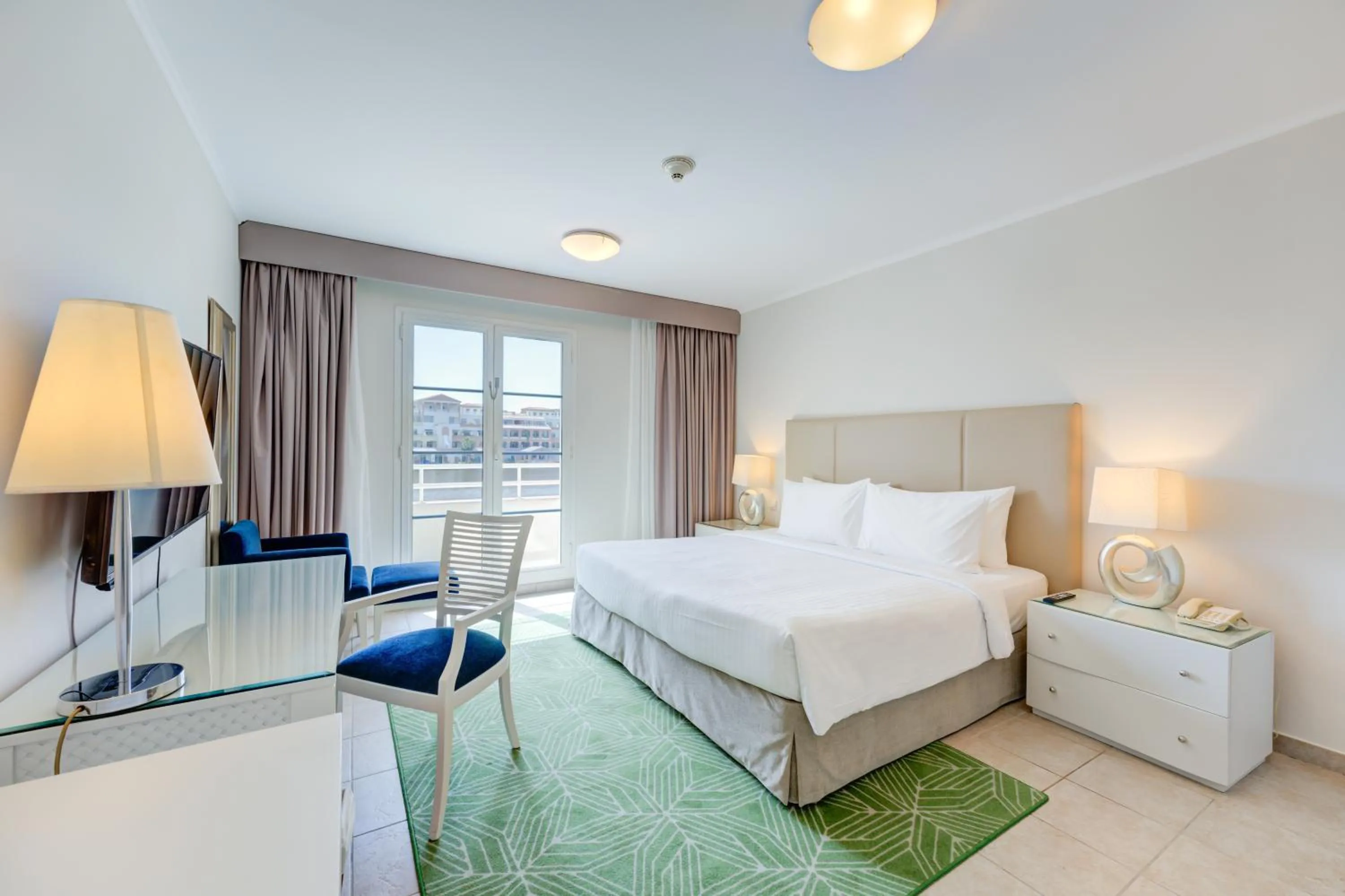 Bedroom, Bed in Millennium Lakeview Residences