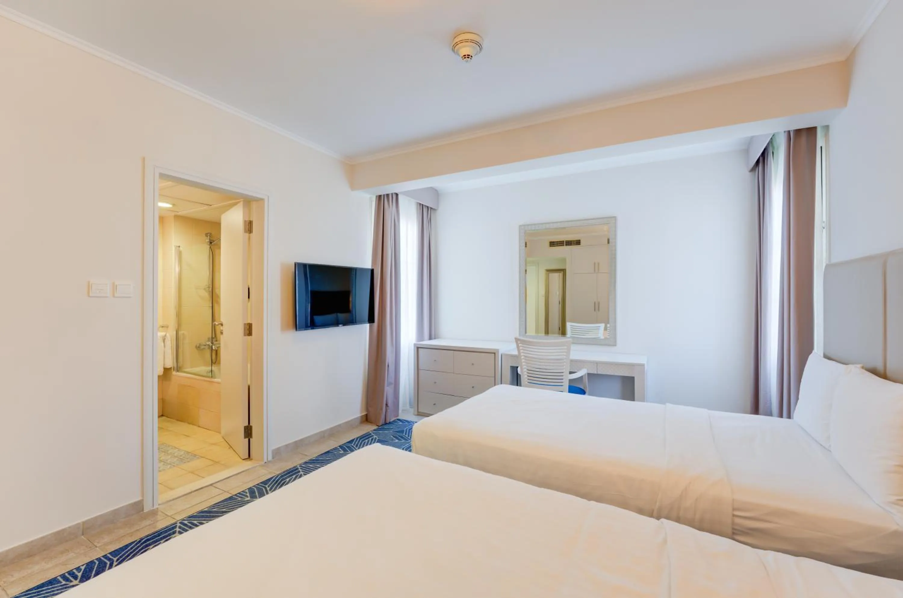 Bedroom, Bed in Millennium Lakeview Residences