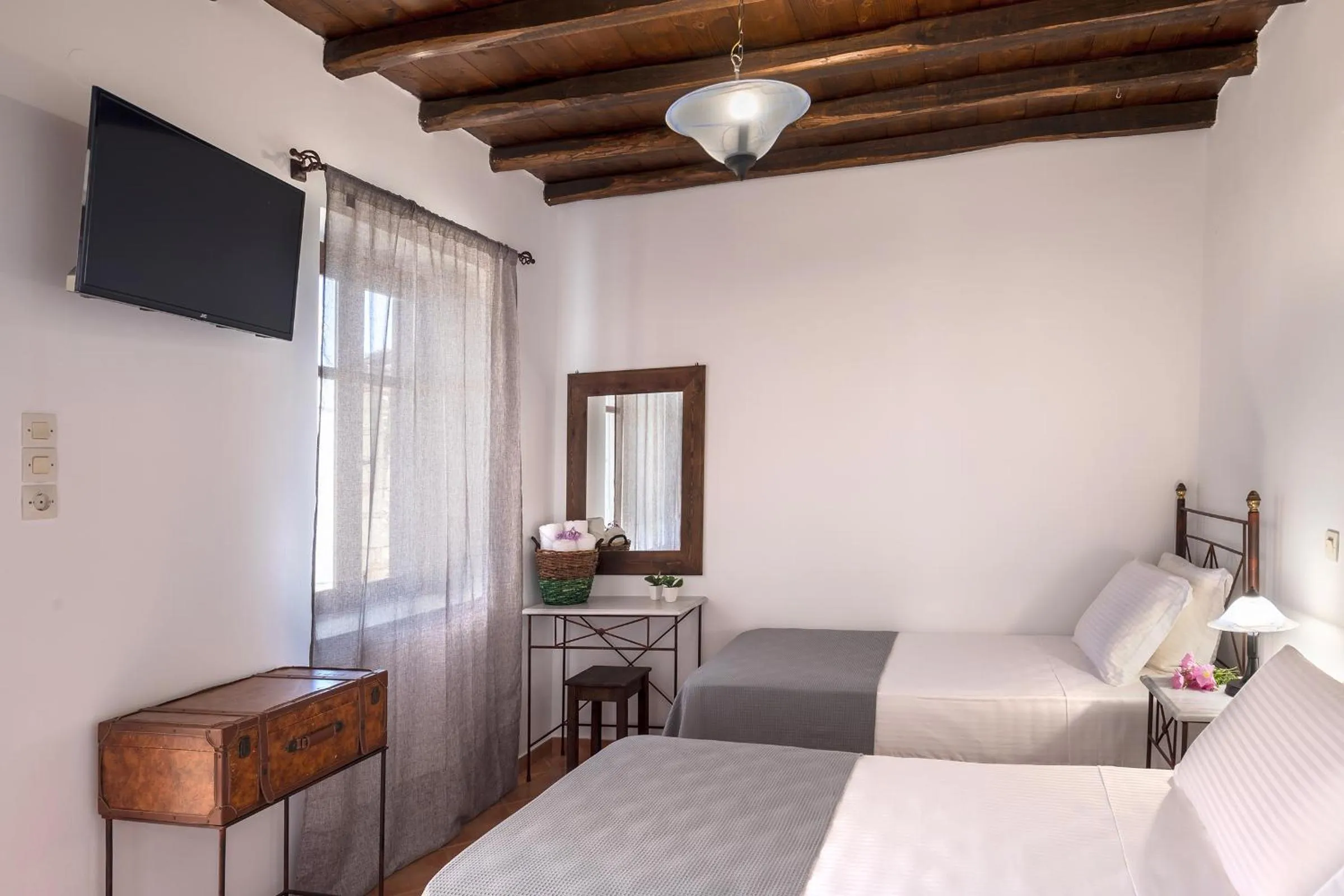 Bed in Cochili Rooms & Apartments