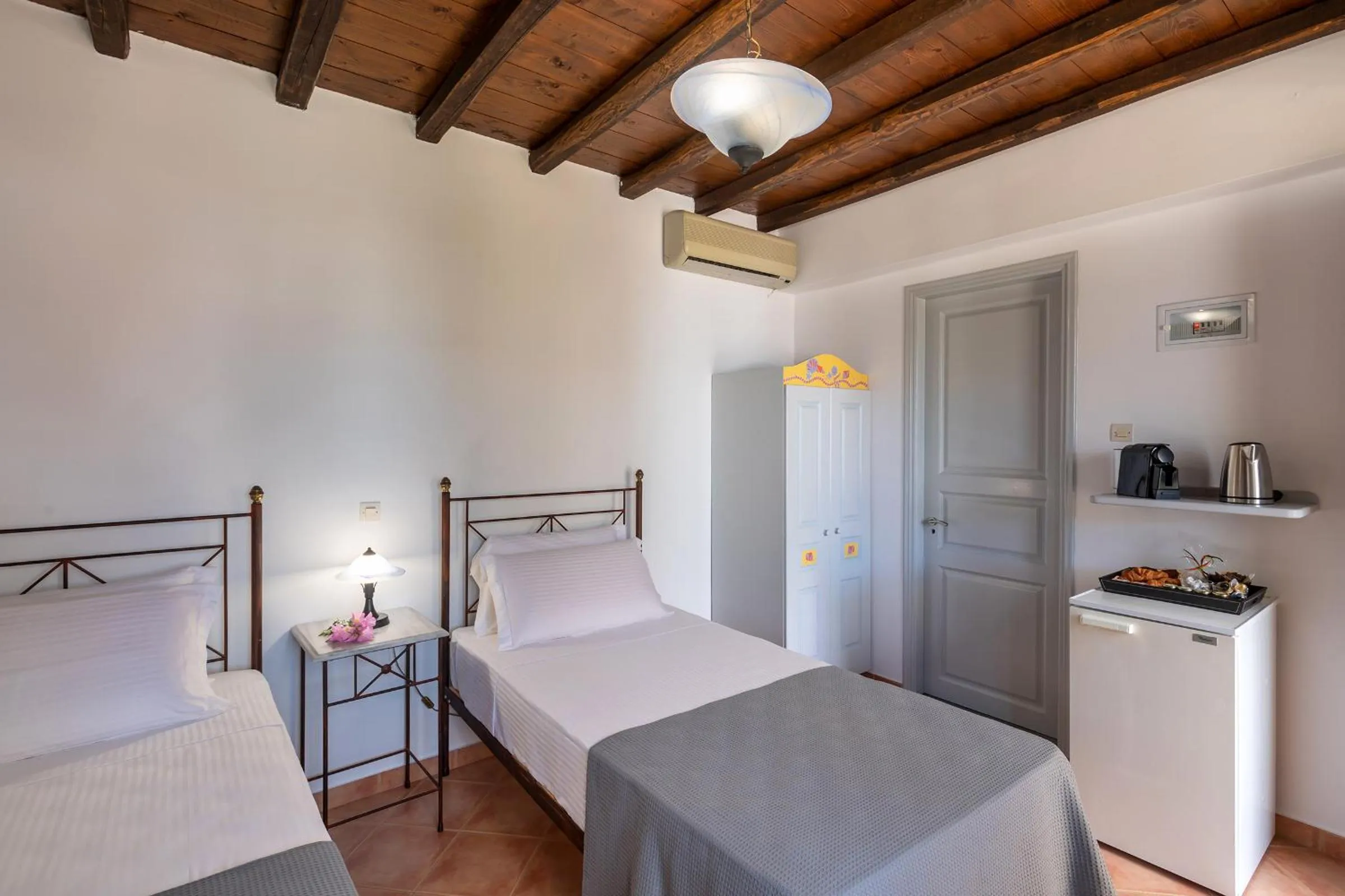 Bed in Cochili Rooms & Apartments