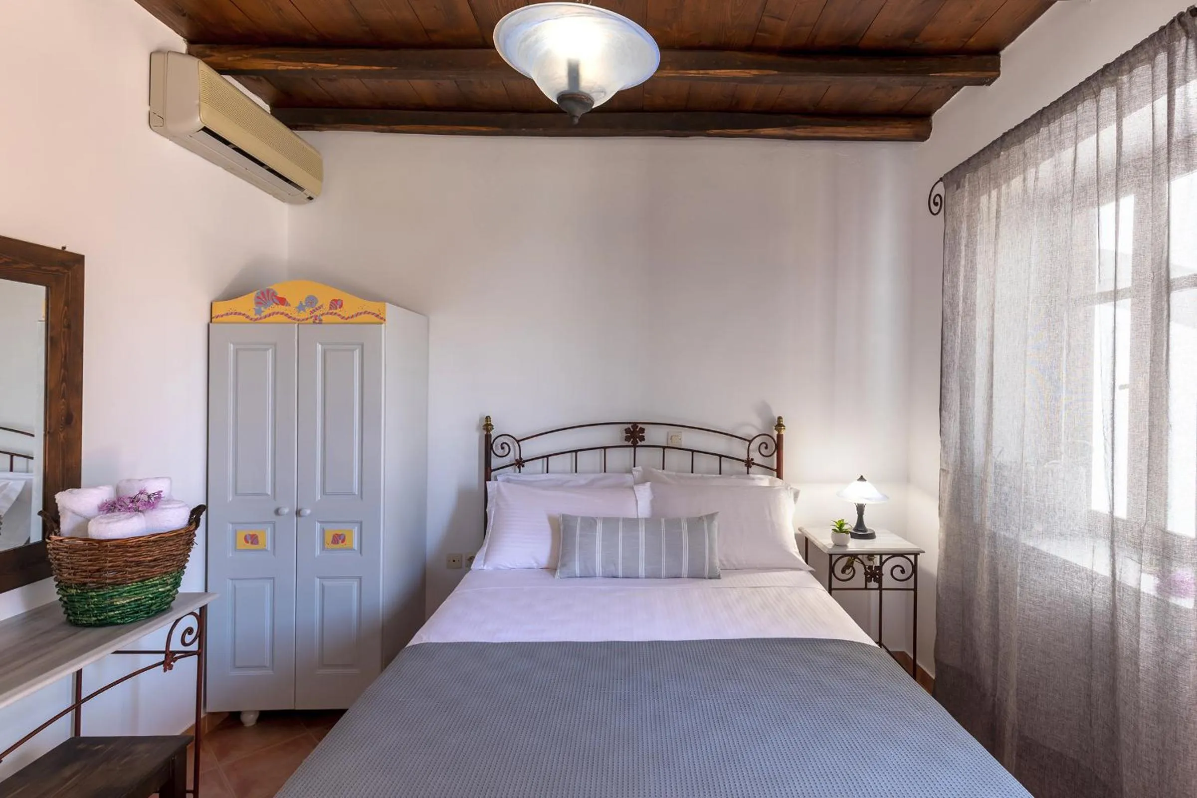 Bed in Cochili Rooms & Apartments