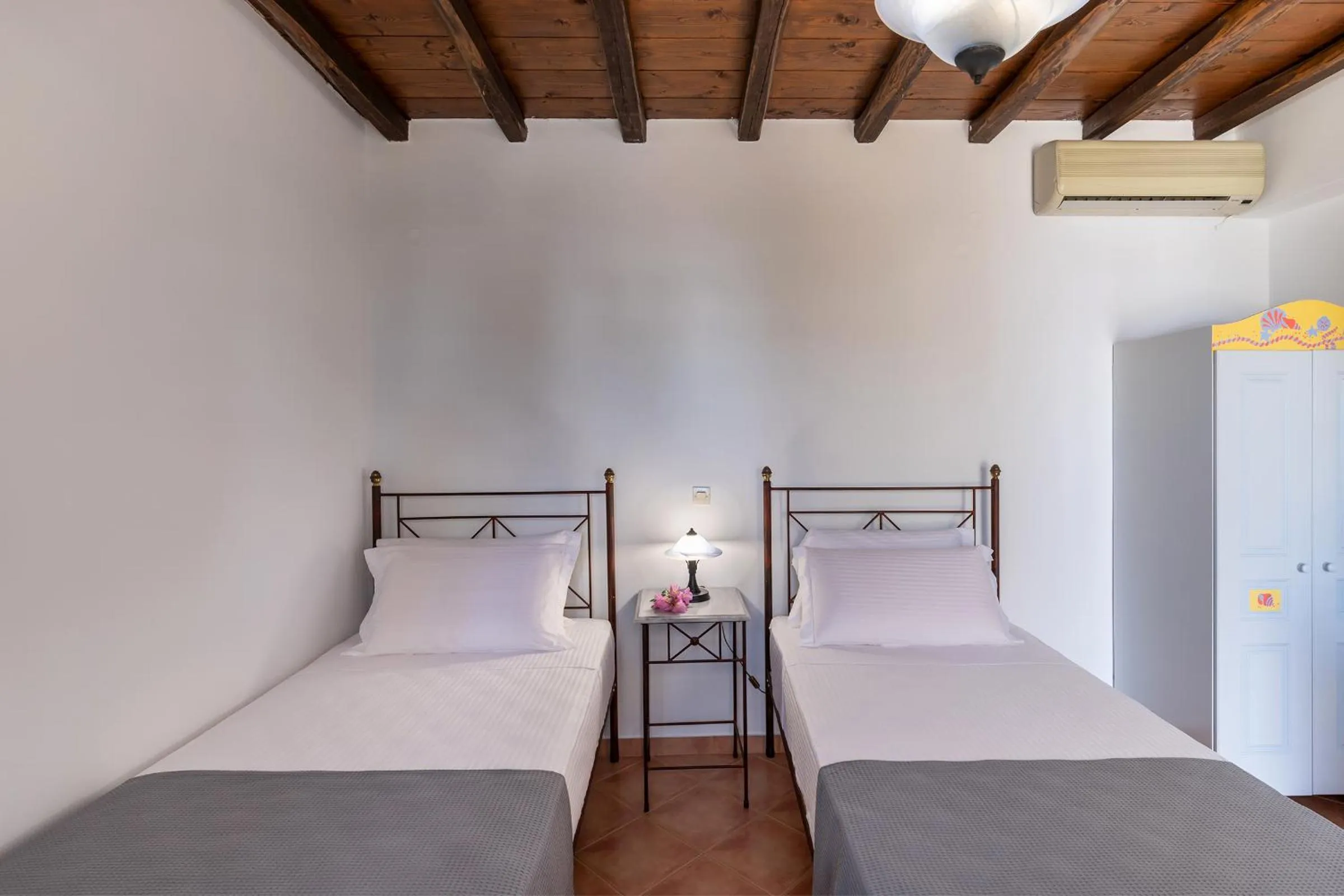 Bed in Cochili Rooms & Apartments