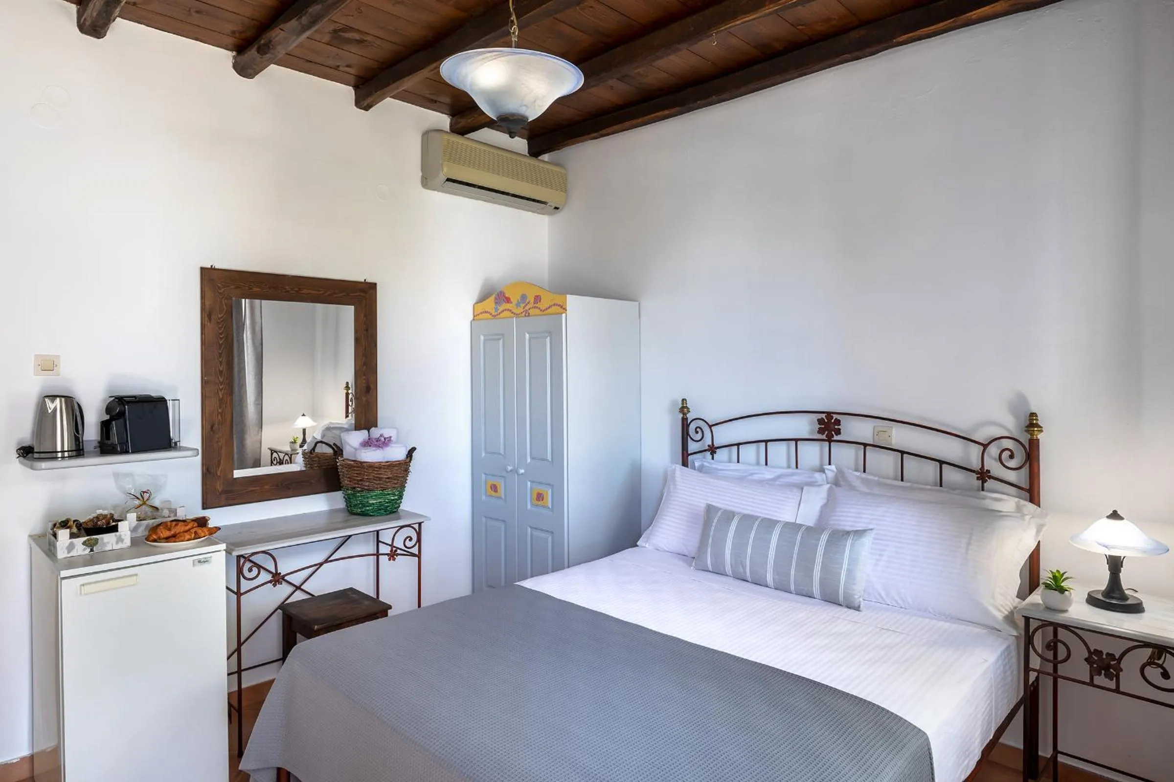 Bed in Cochili Rooms & Apartments