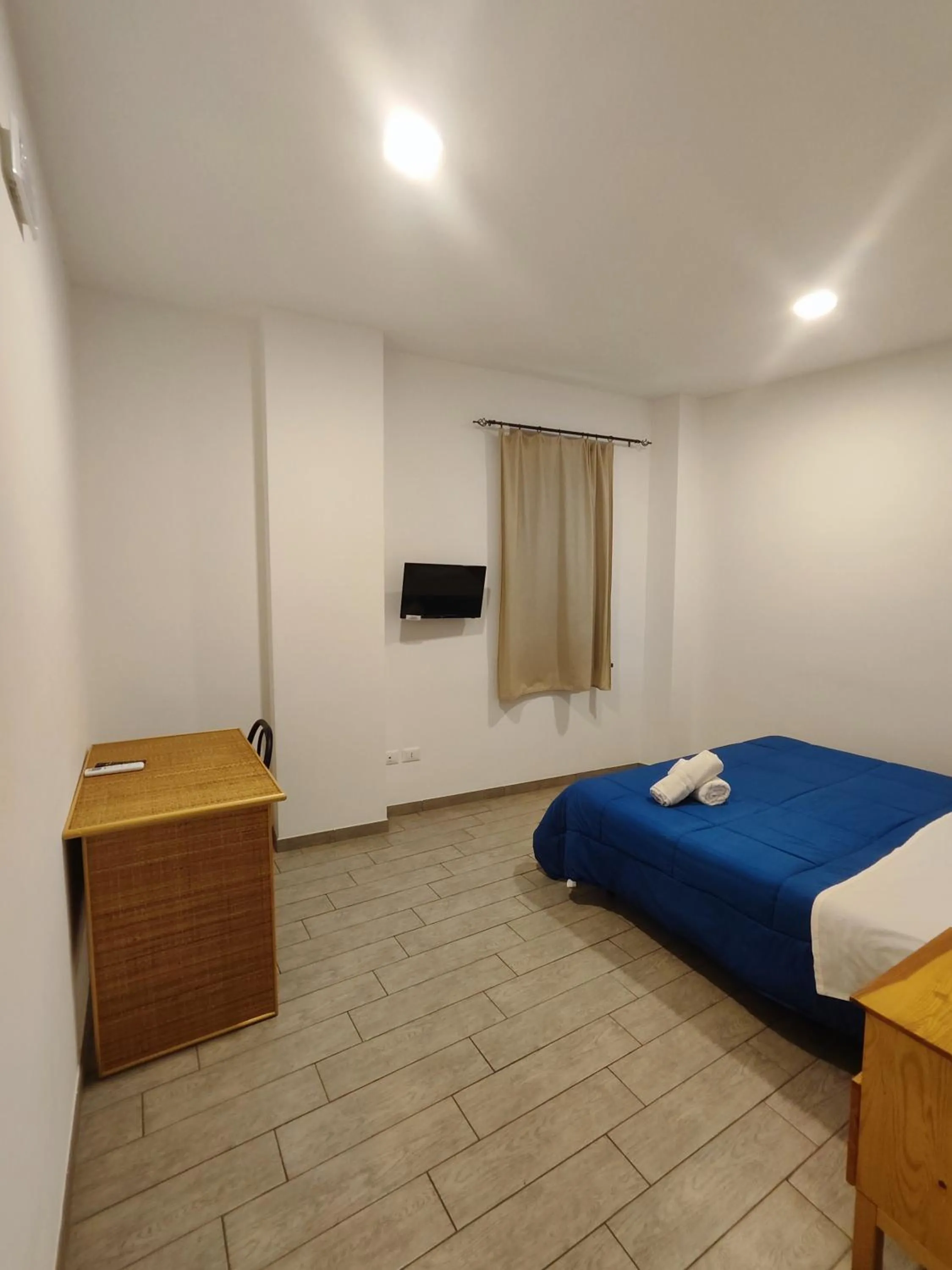 Bed in Hotel Faraglione