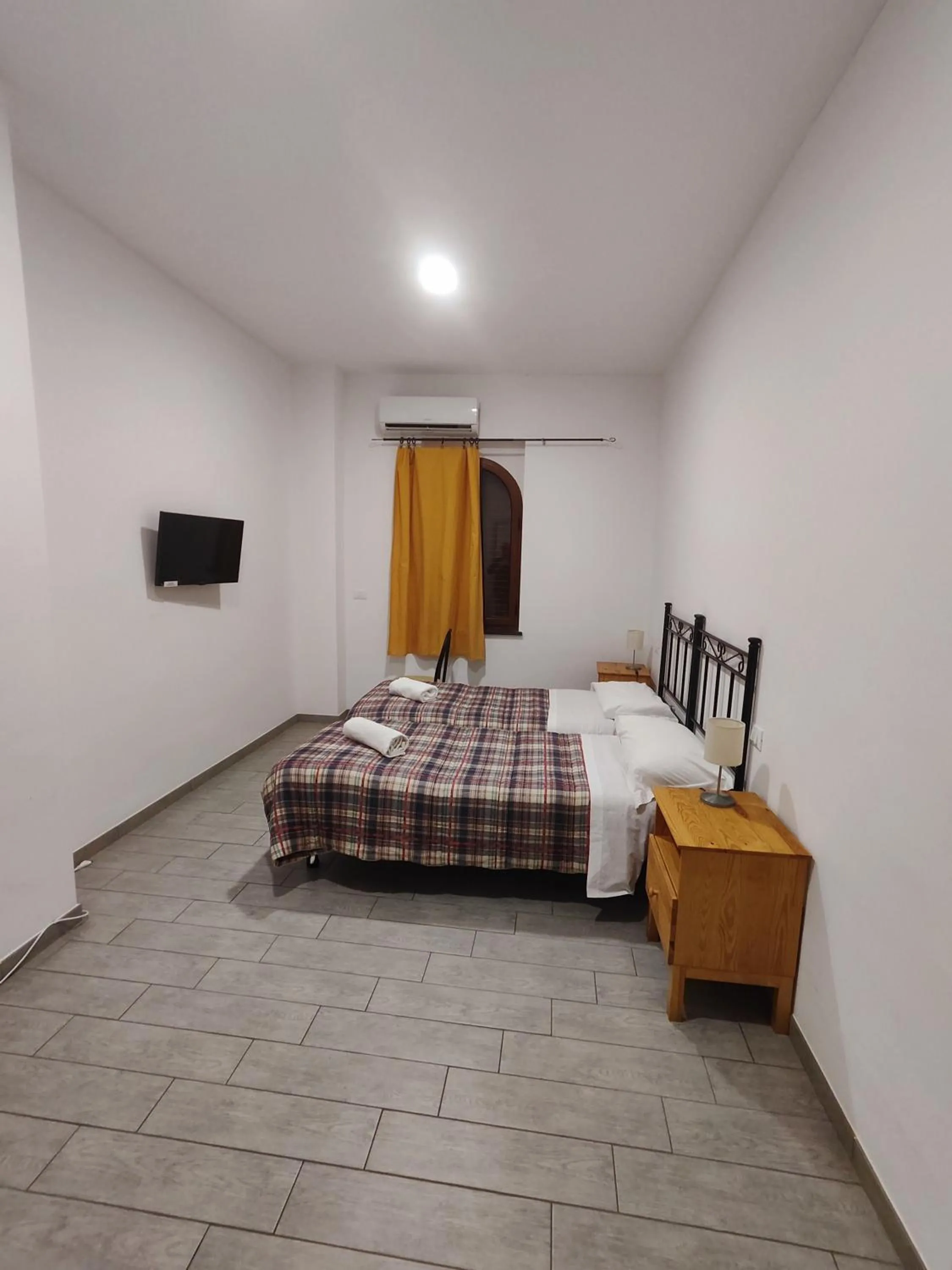 Bed in Hotel Faraglione