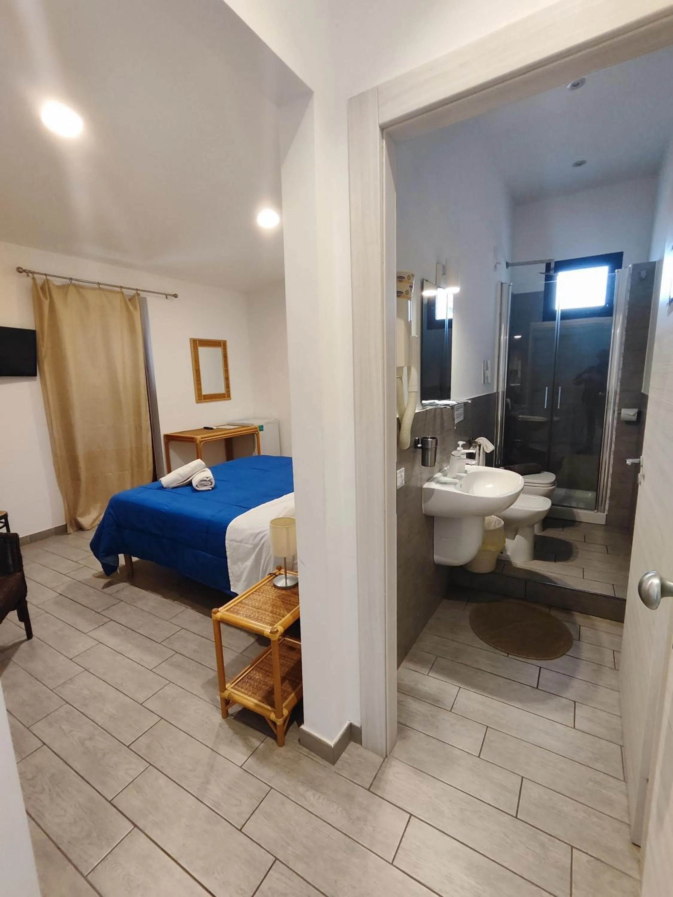 Bed in Hotel Faraglione