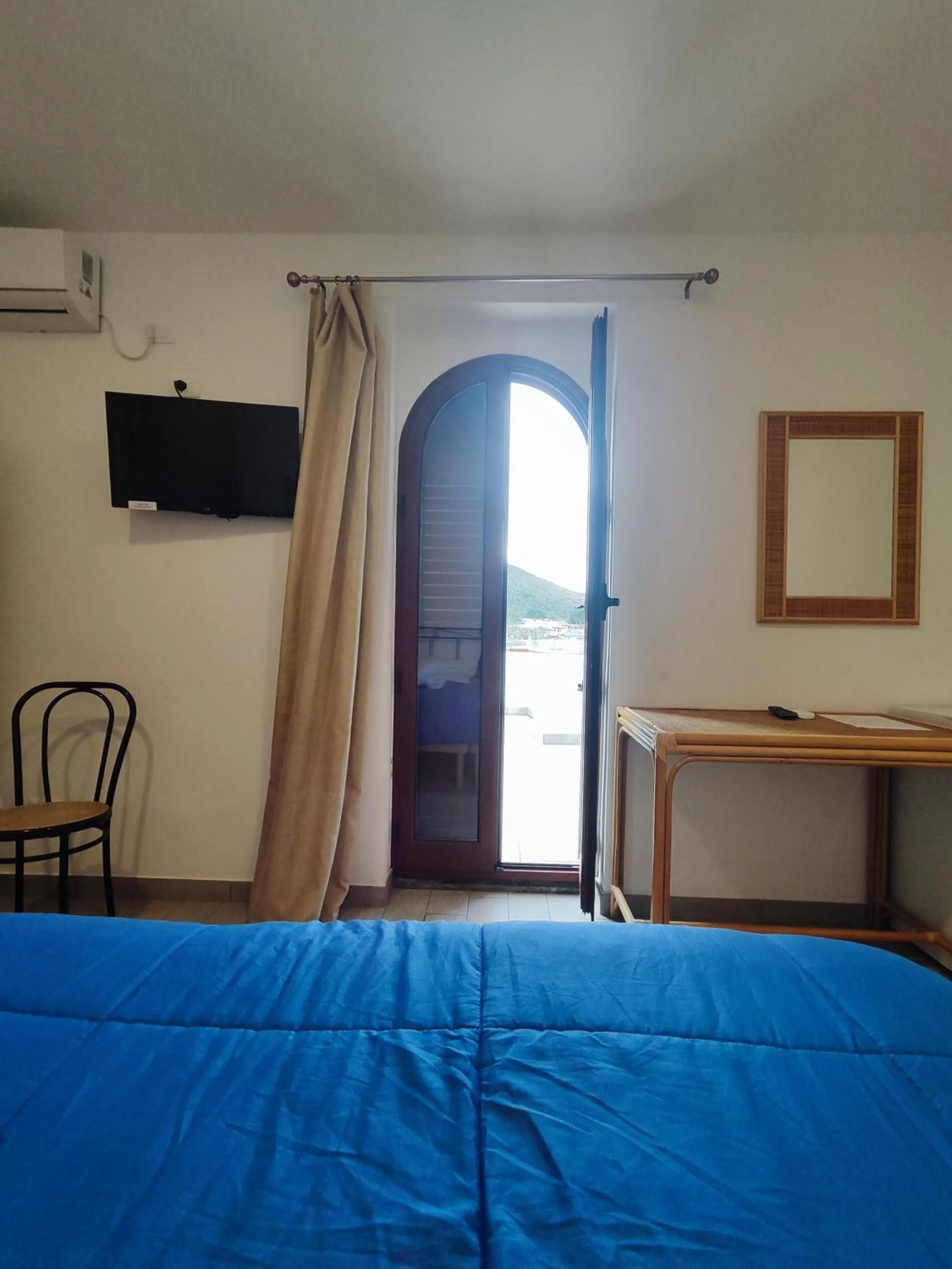 Bed in Hotel Faraglione