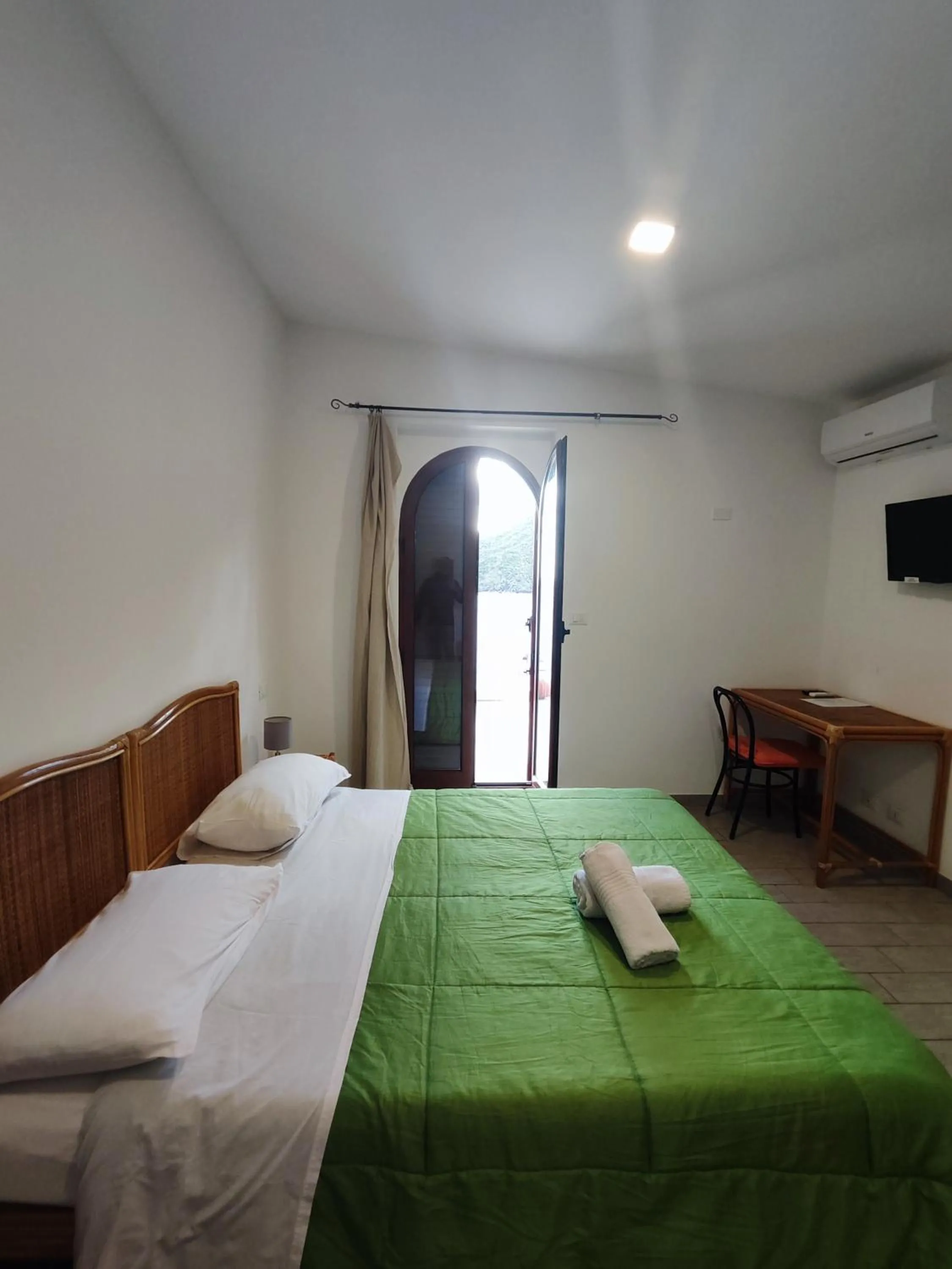 Bed in Hotel Faraglione