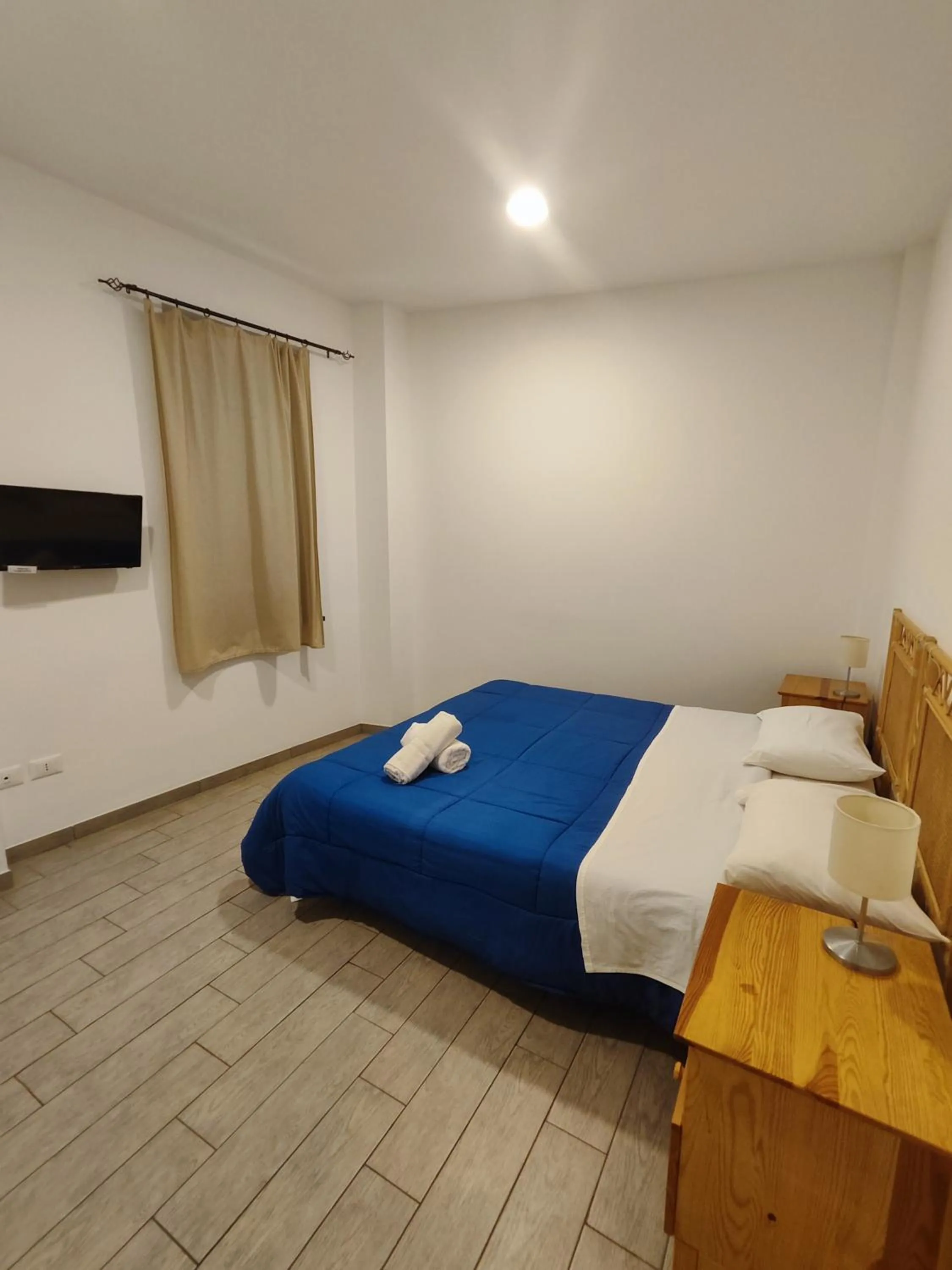 Bed in Hotel Faraglione