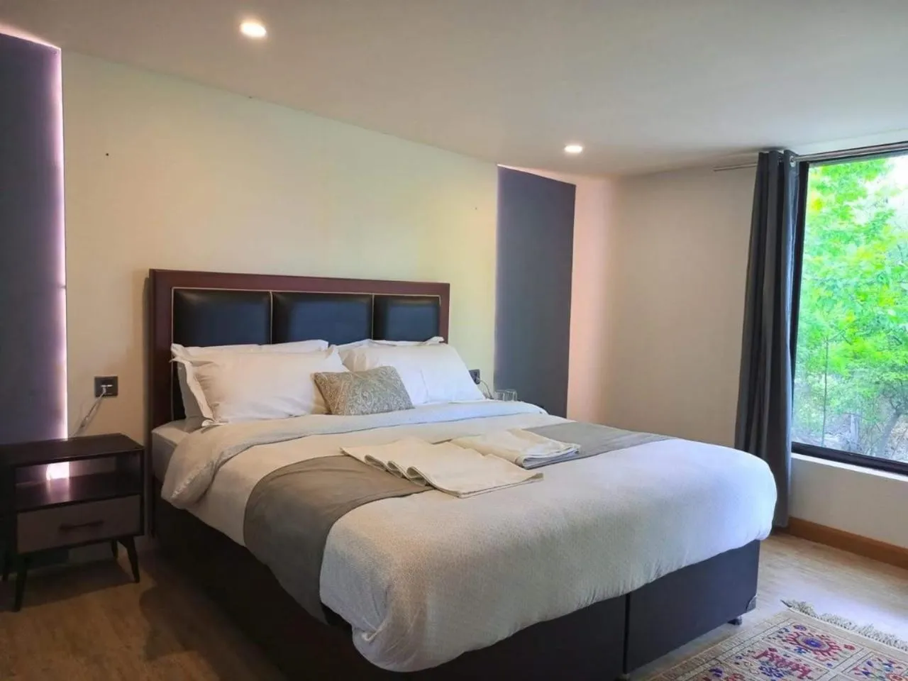 Bed in Grapes Garden Resort Hunza