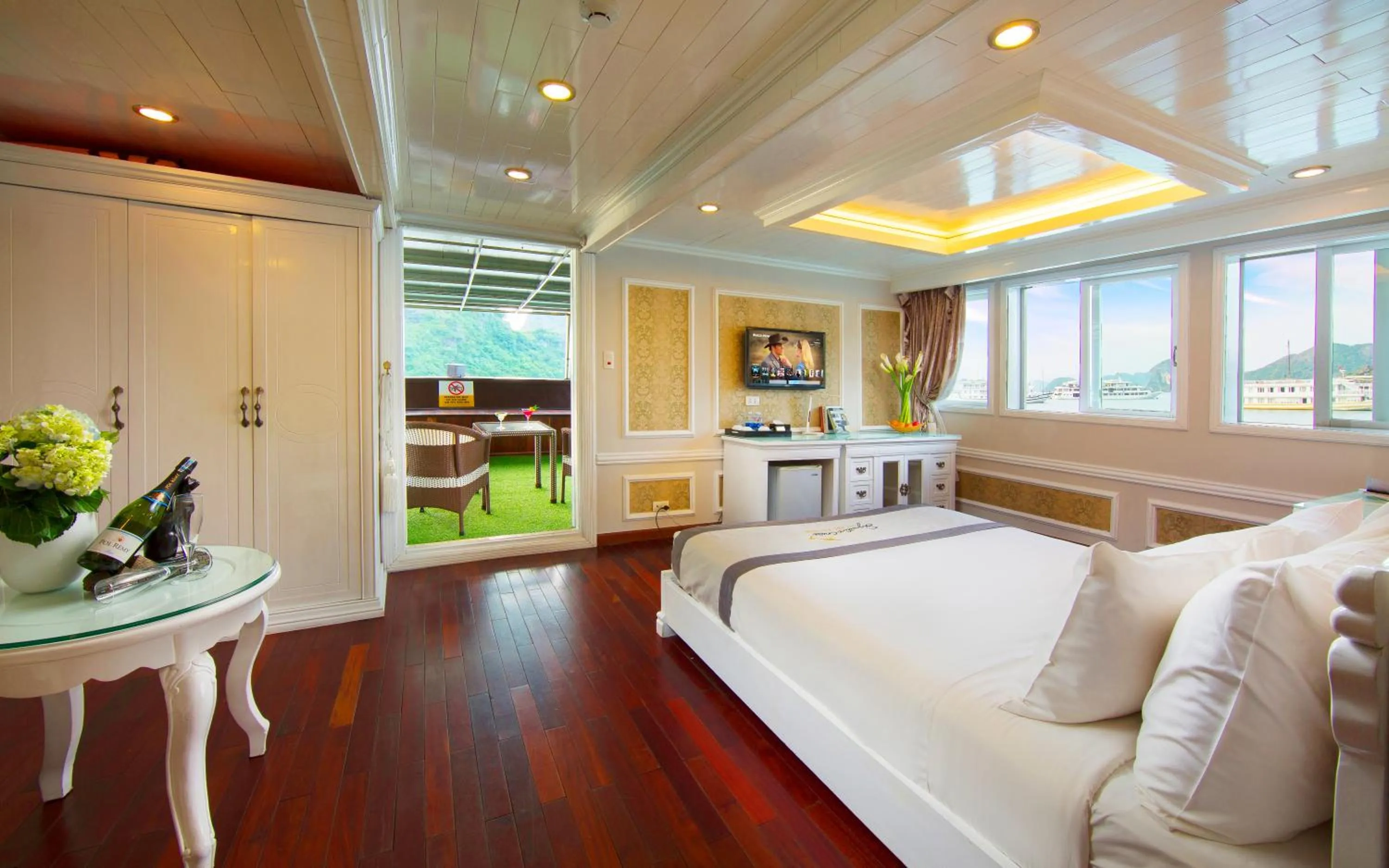 Living room, Bed in Signature Halong Cruise