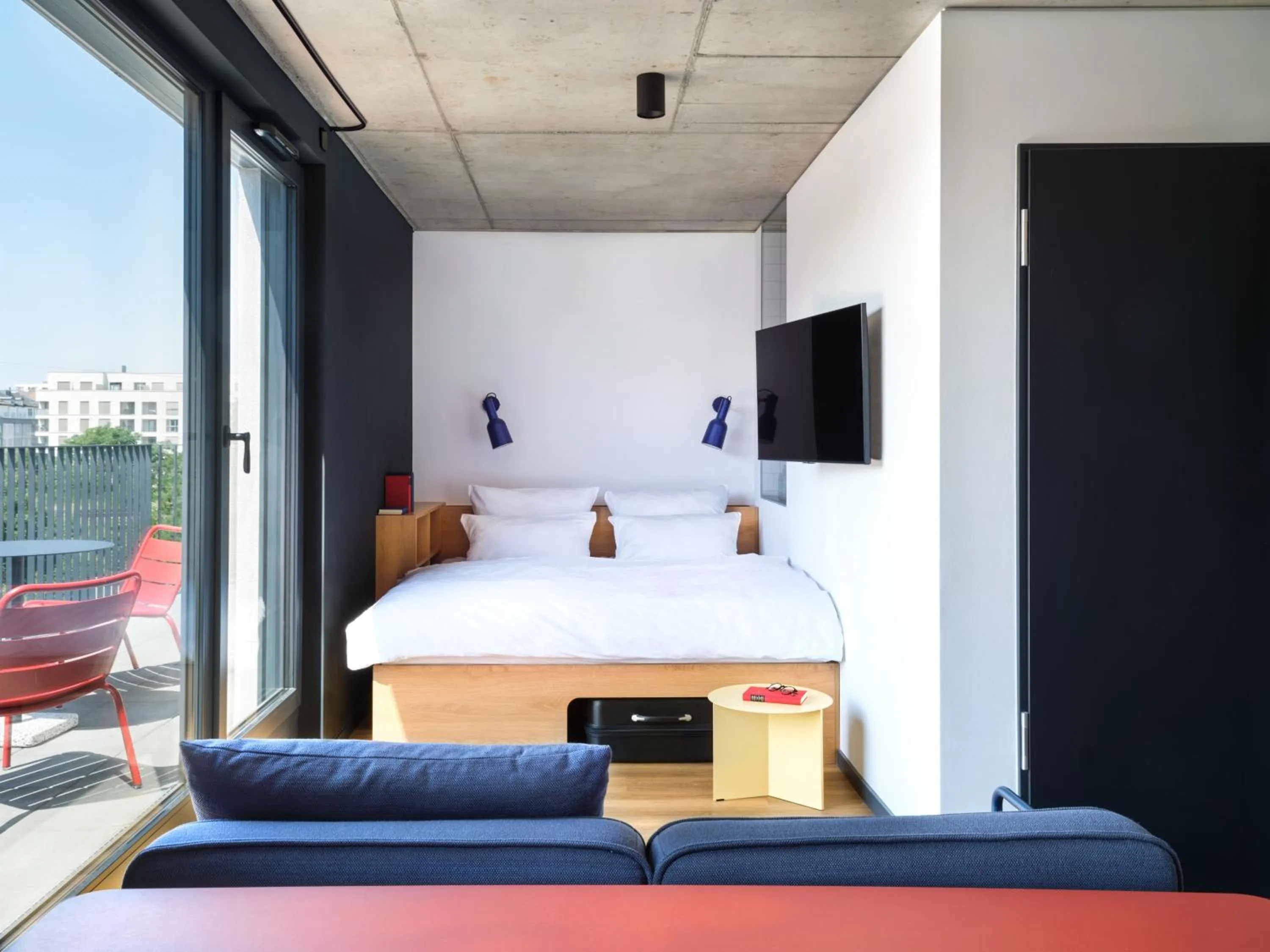 Bed in STAYERY Frankfurt Sachsenhausen