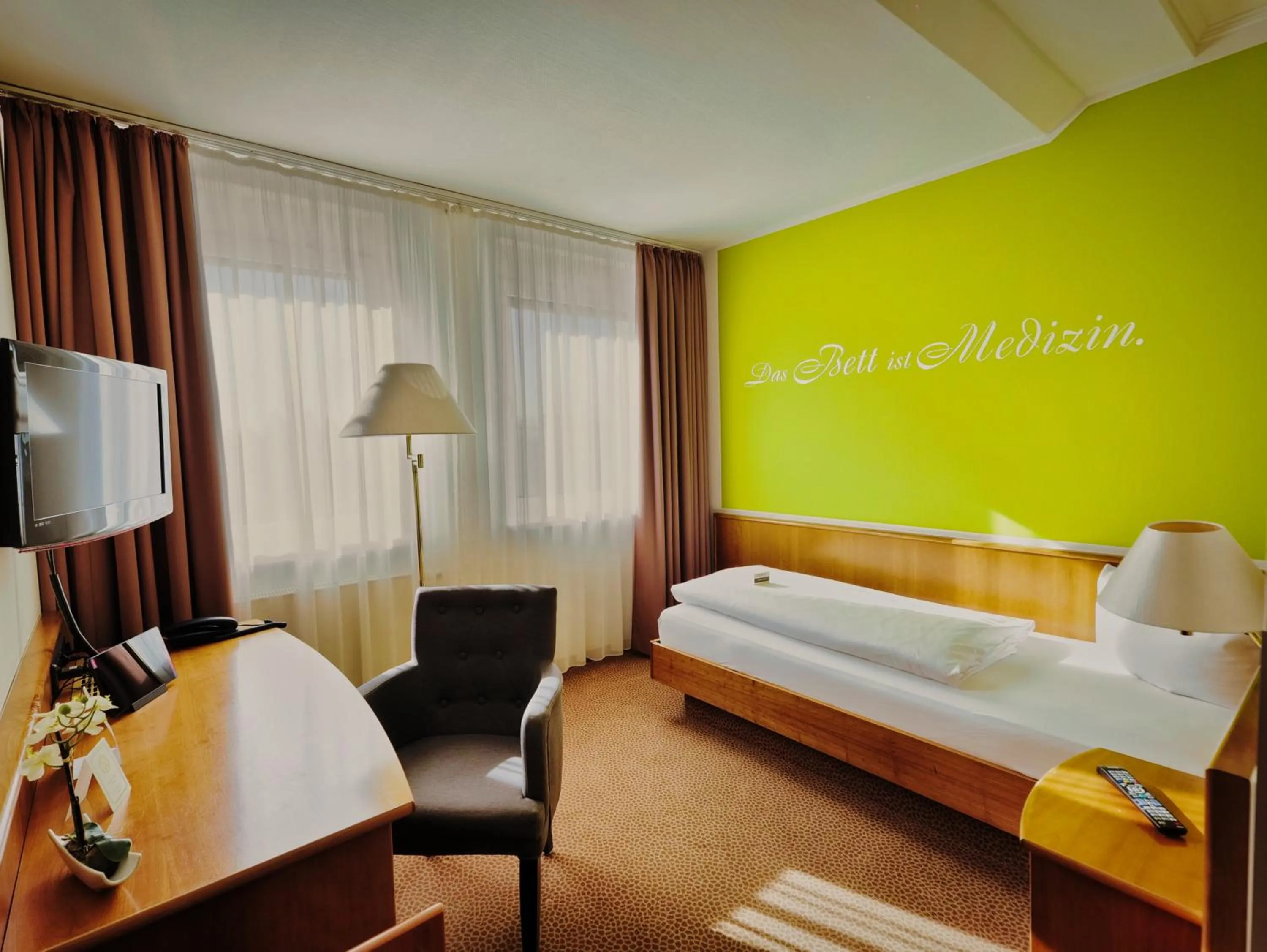 Photo of the whole room, Bed in Hotel Sportwelt Radeberg
