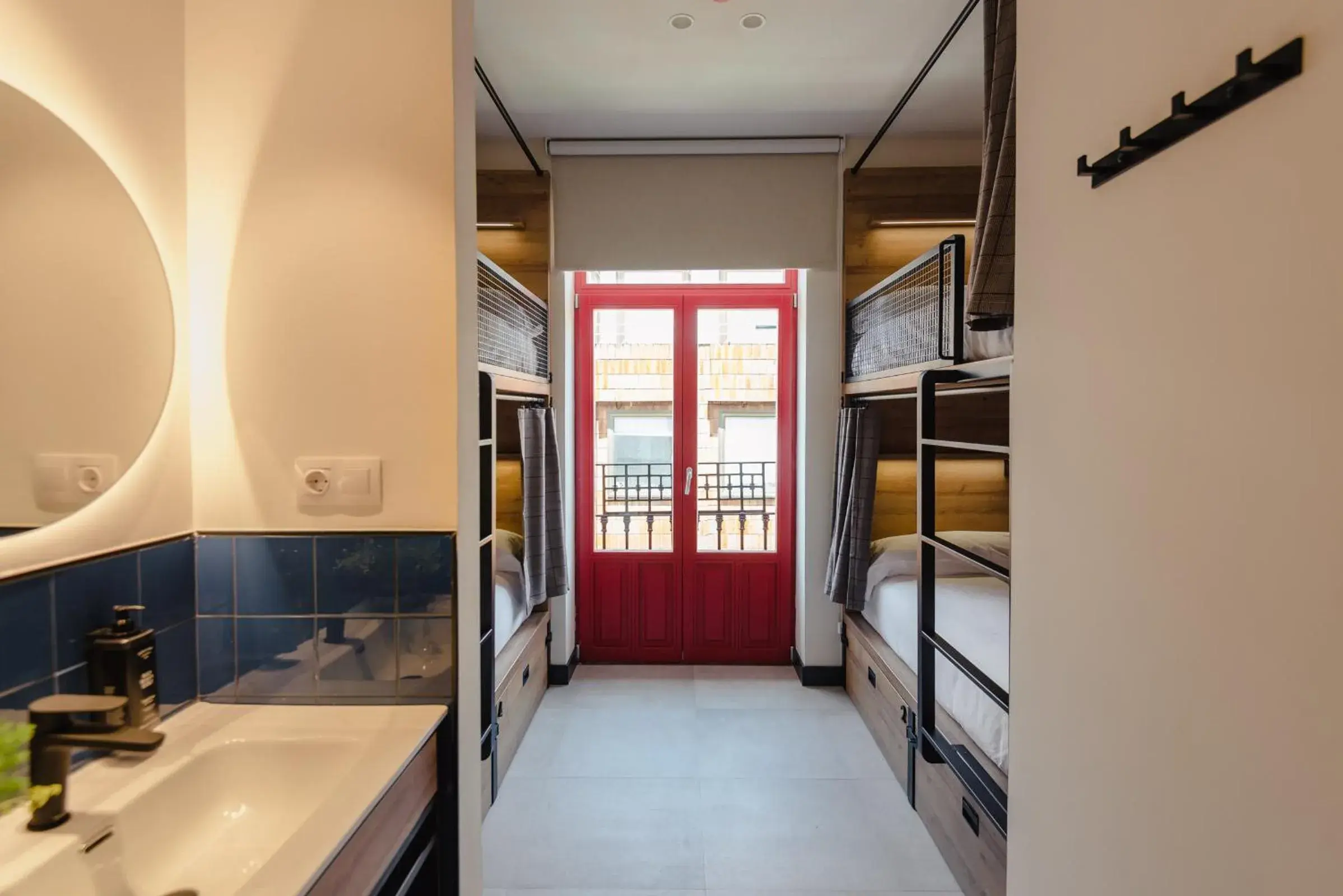 Bed in 4-Bed Mixed Dormitory Room in LATROUPE La Granja Bed in 4-Bed Mixed Dormitory Room in LATROUPE La Granja