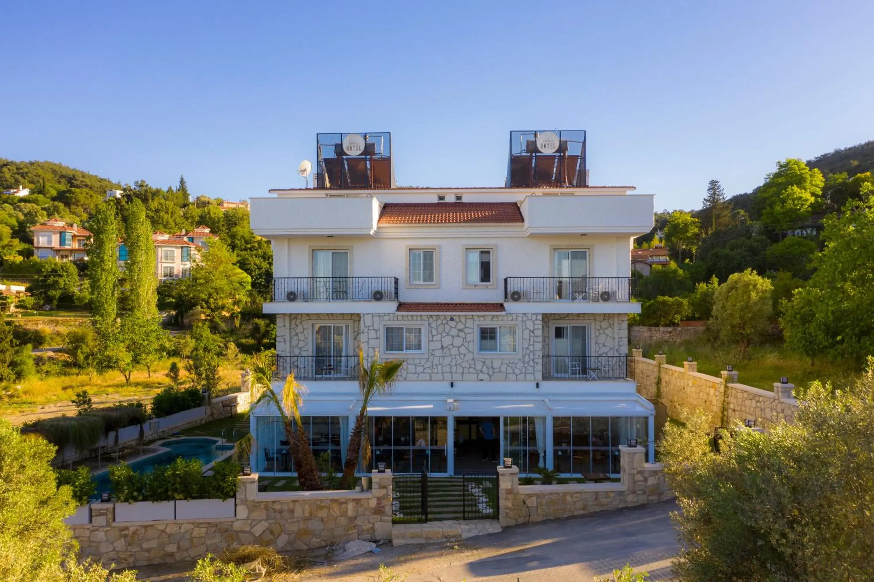 Property building in Urla 1867 Hotel Property building in Urla 1867 Hotel