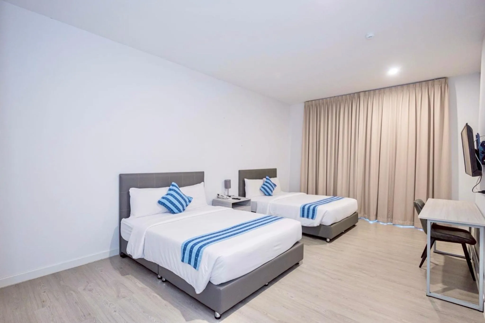 Bed in GRAND PA Hotel&Resort Lamphun Chiang Mai