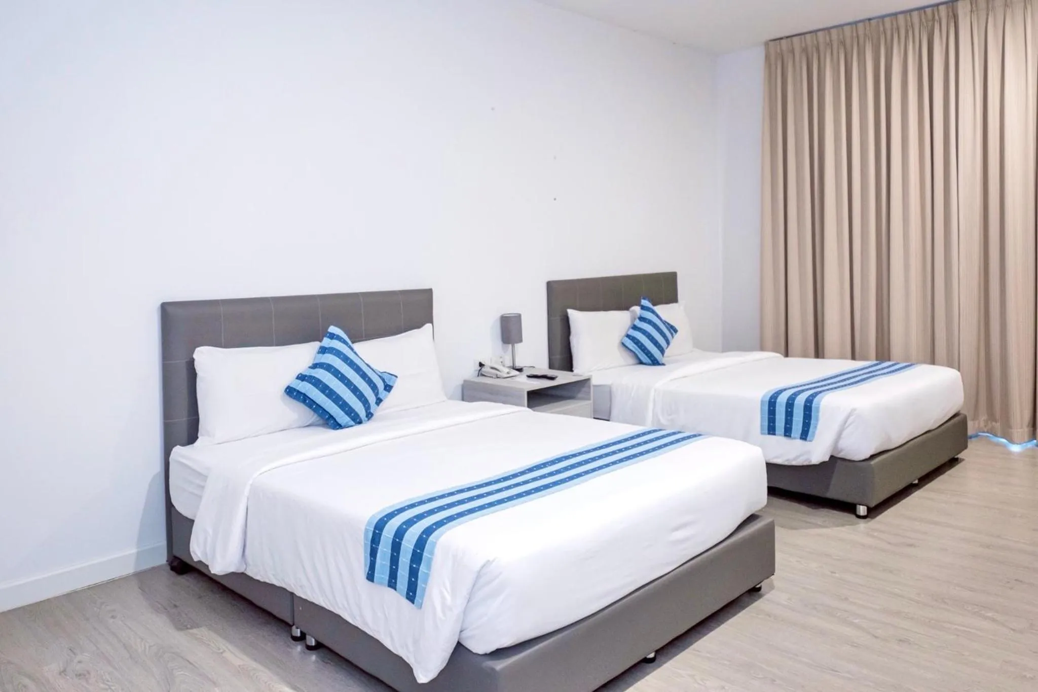 Bed in GRAND PA Hotel&Resort Lamphun Chiang Mai