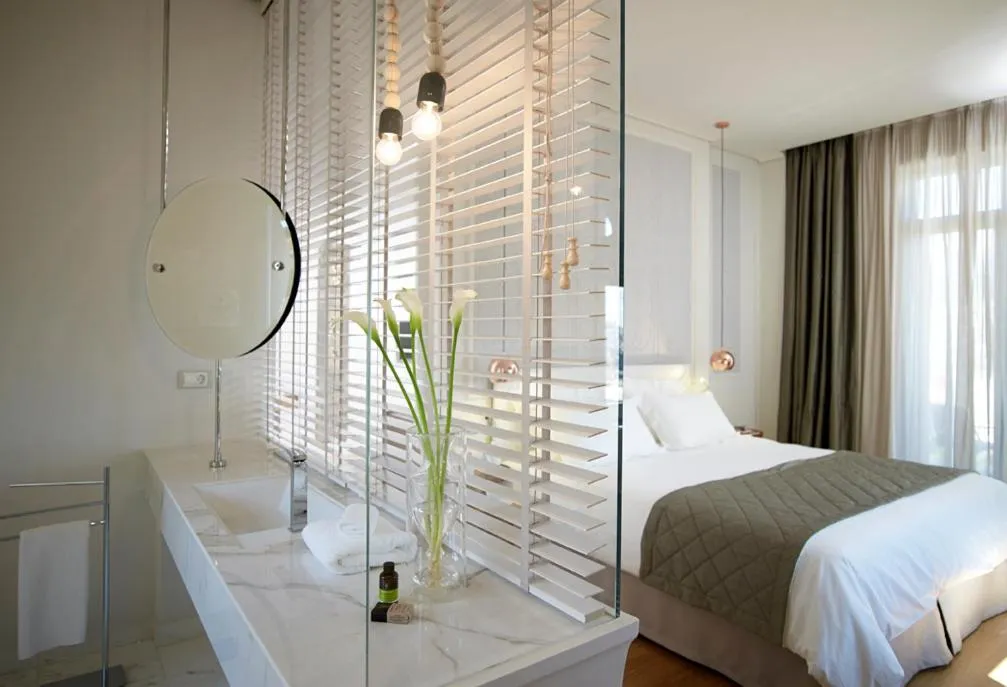 Bathroom, Bed in Marpessa Hotel & Spa