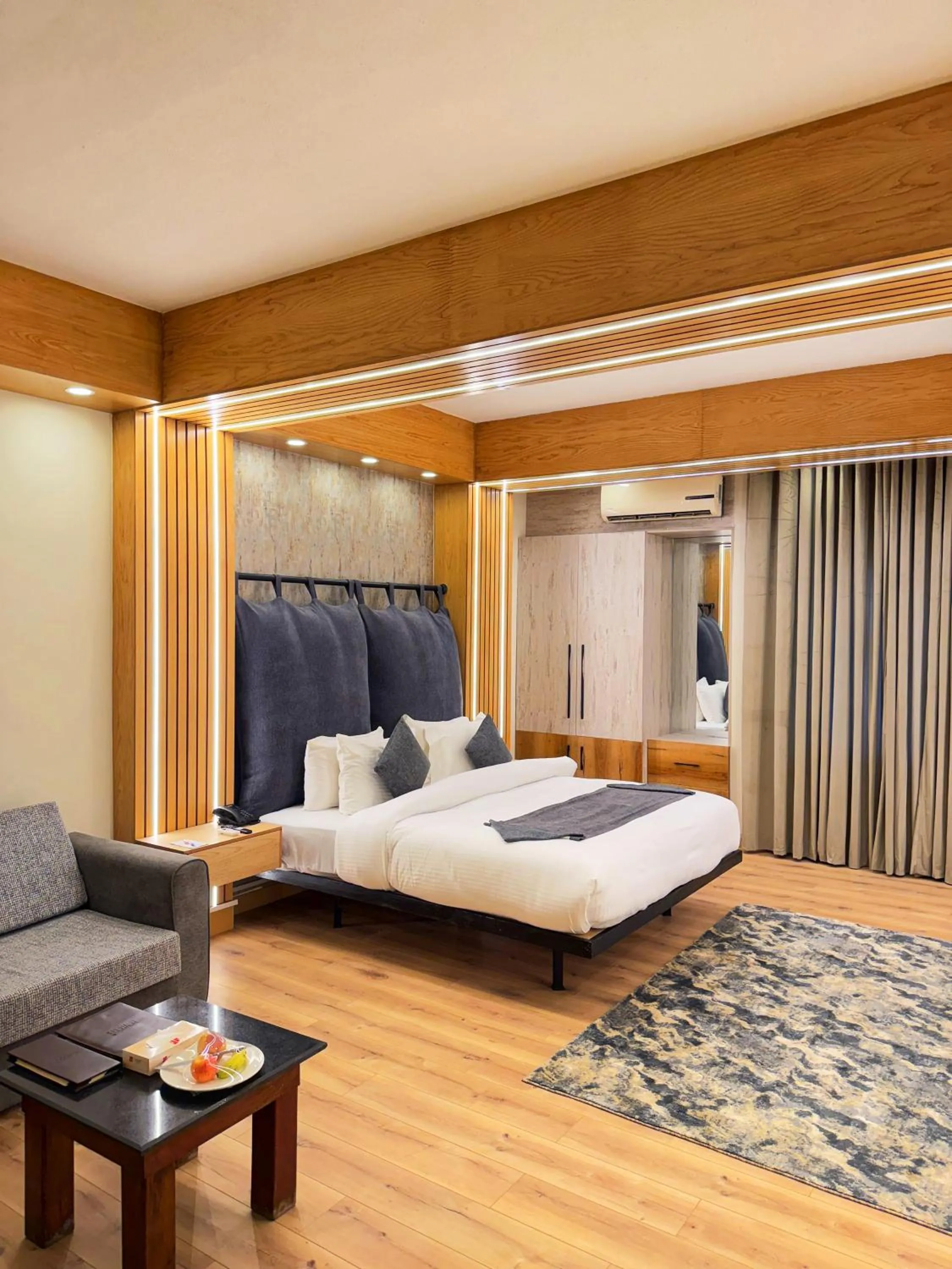 Bed in Grand Islamabad Hotel