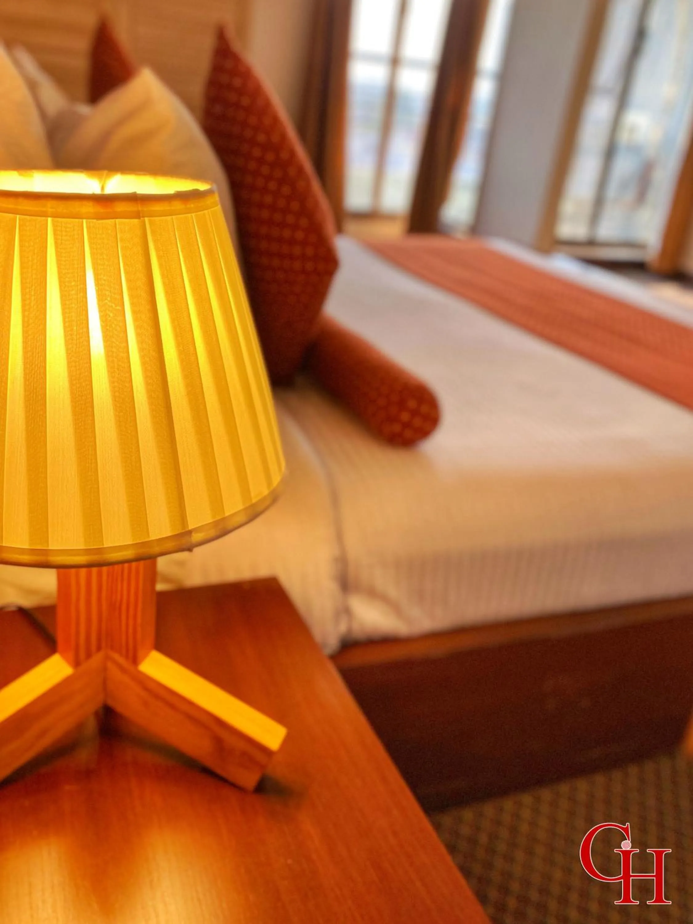 Bed in Grand Islamabad Hotel