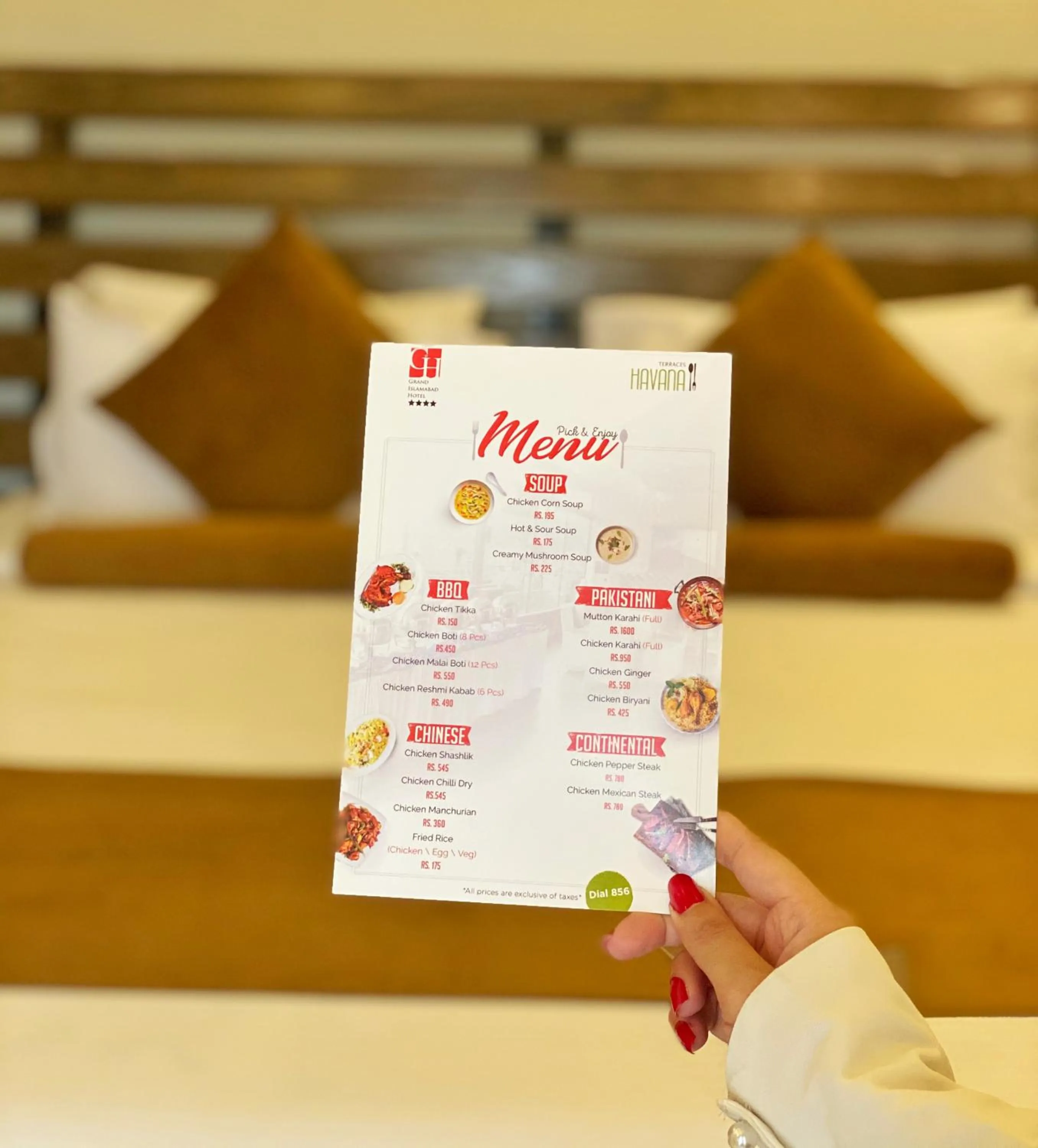 Bed in Grand Islamabad Hotel