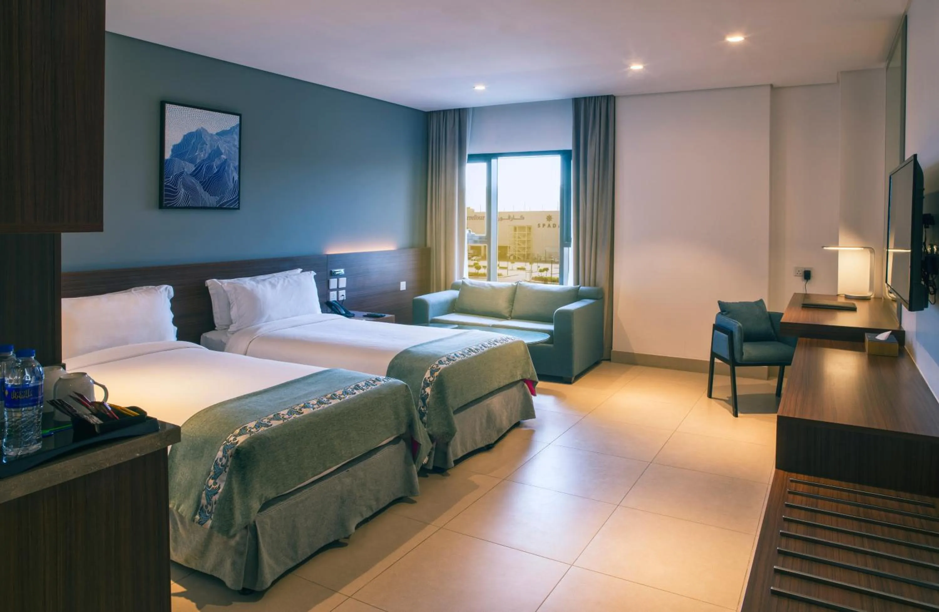 Living room, Bed in Boulevard Hotel Oman