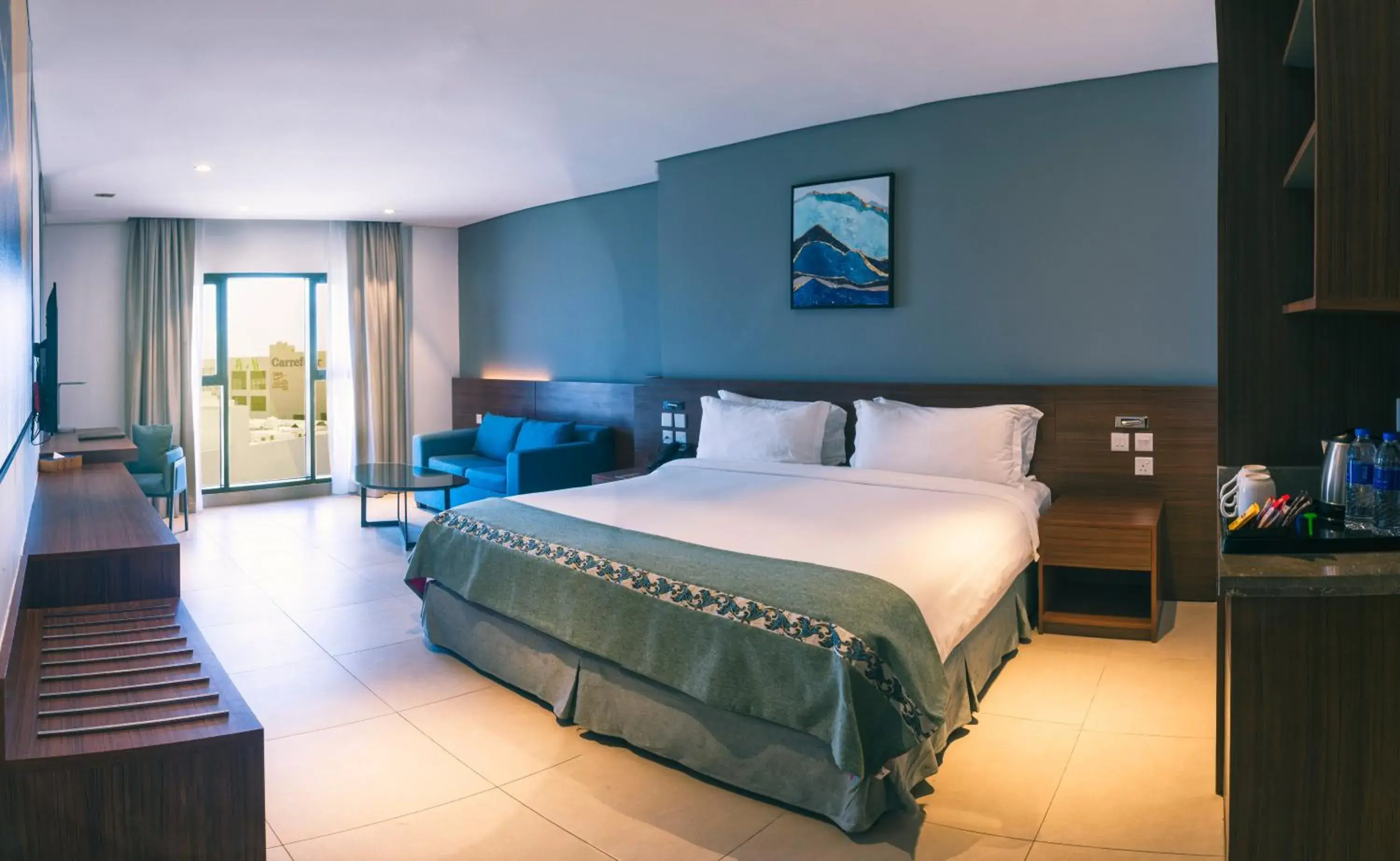 Living room, Bed in Boulevard Hotel Oman Living room, Bed in Boulevard Hotel Oman