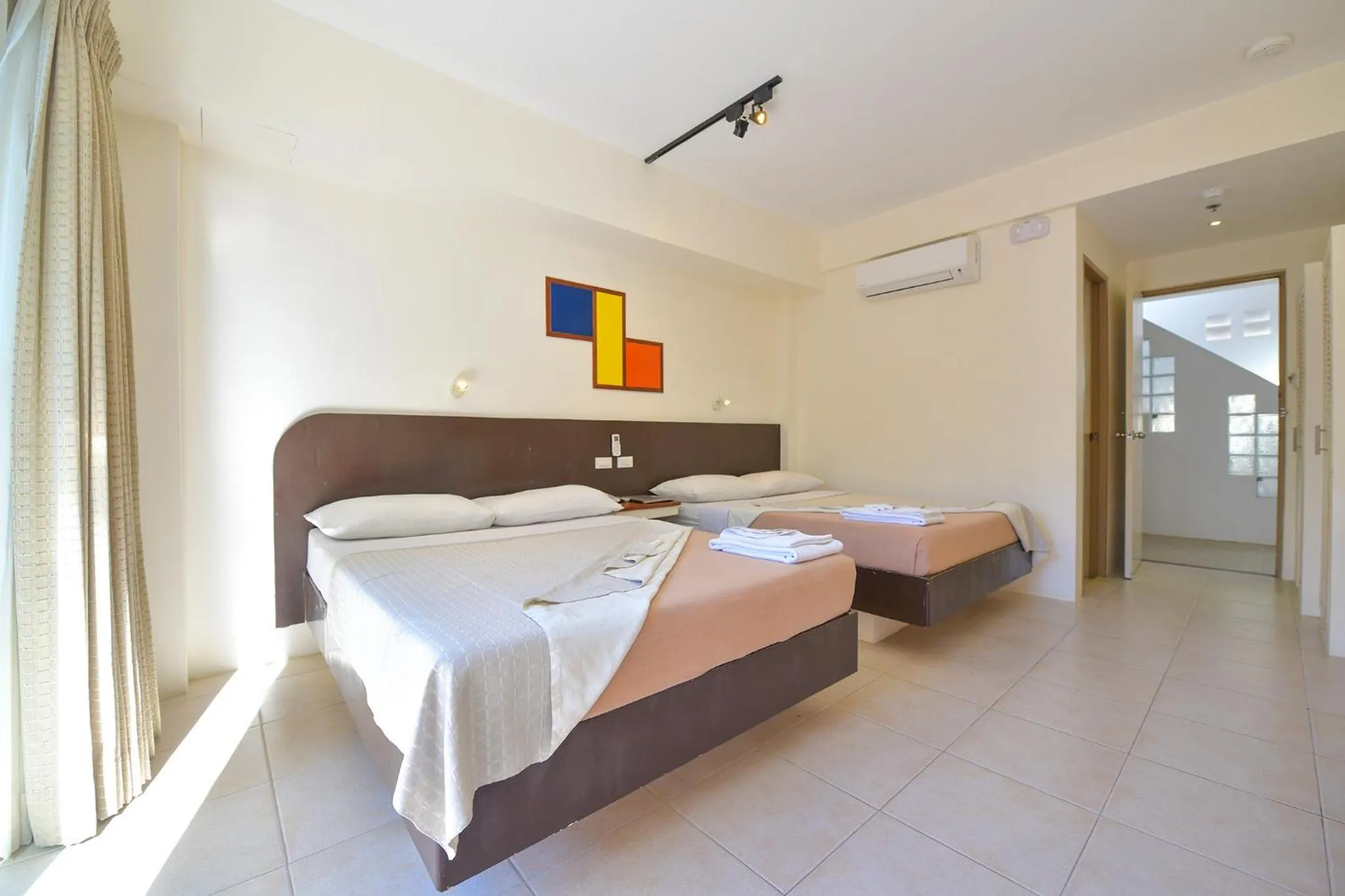 Bed in Signature Boracay South Beach