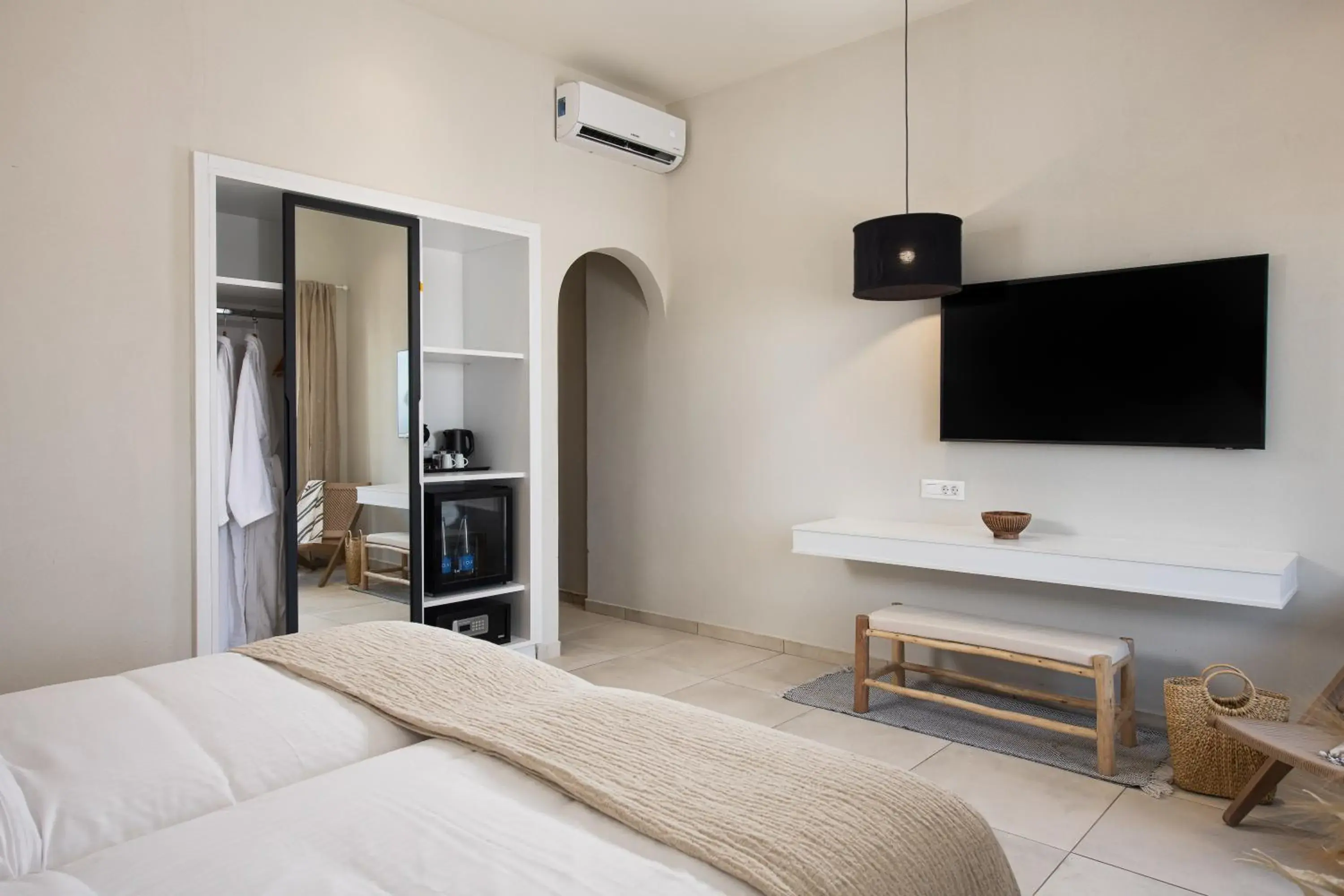 Bed in The Noverian Bios Santorini Boutique Hotel Bed in The Noverian Bios Santorini Boutique Hotel