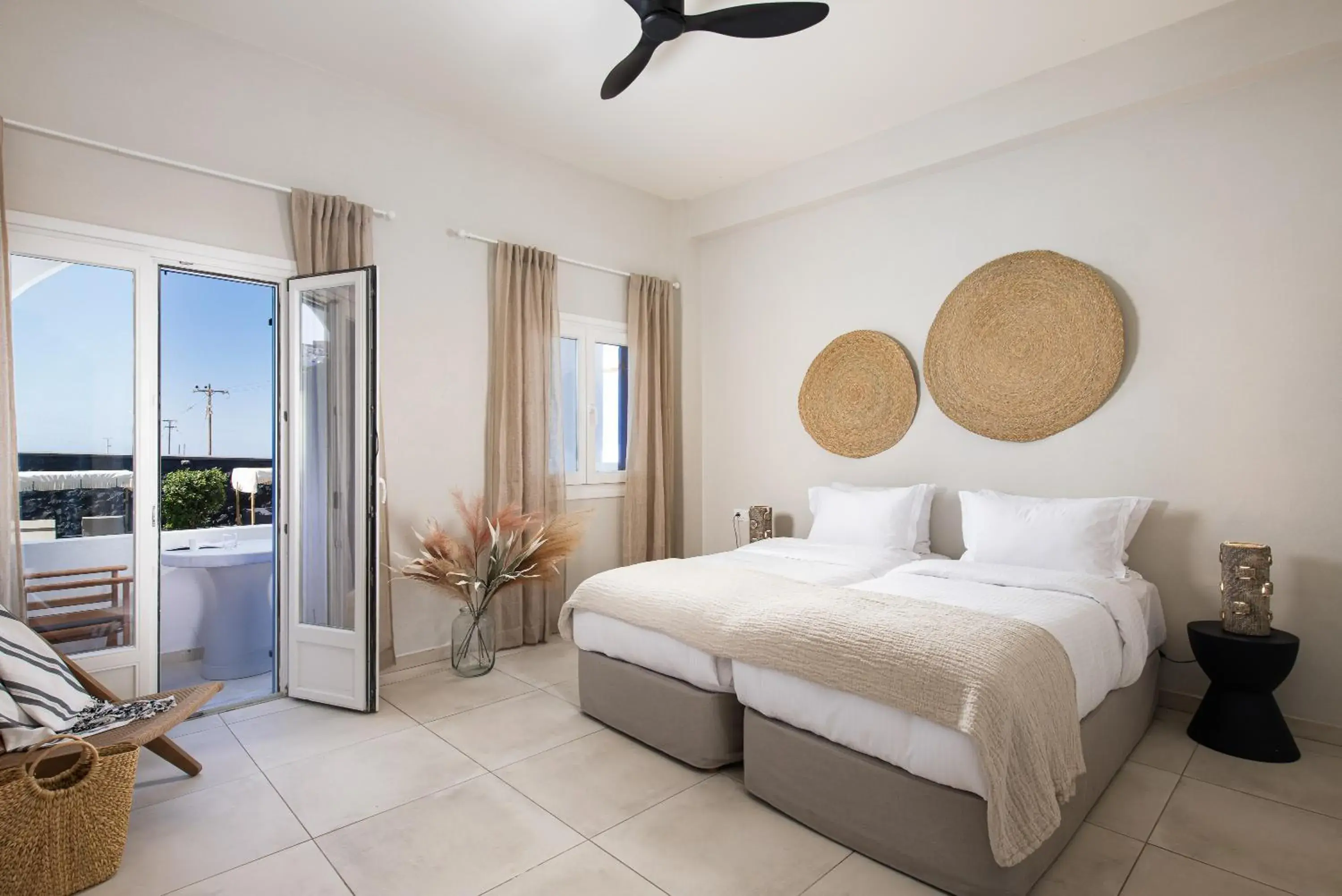 Bed in The Noverian Bios Santorini Boutique Hotel Bed in The Noverian Bios Santorini Boutique Hotel