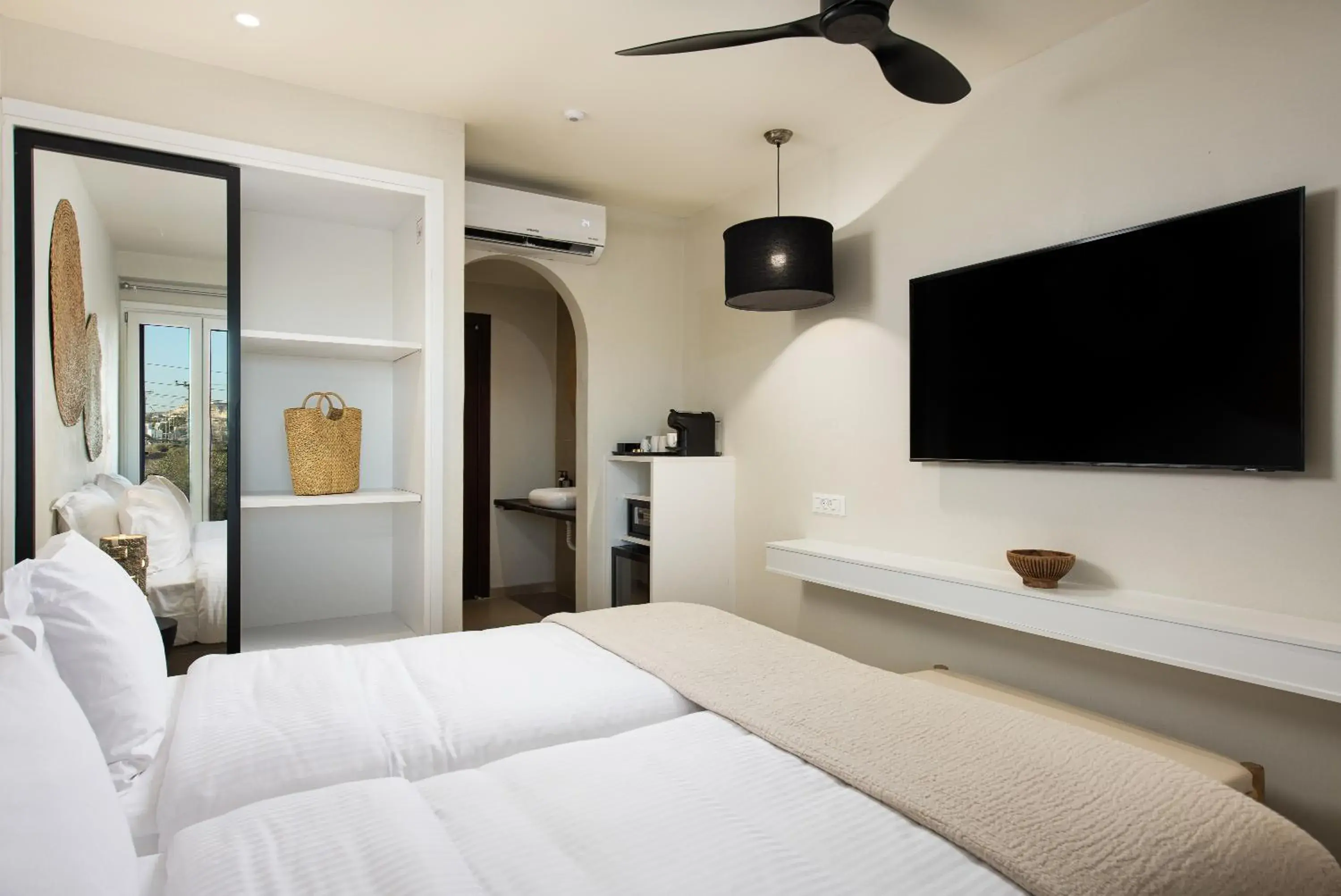 Bed in The Noverian Bios Santorini Boutique Hotel Bed in The Noverian Bios Santorini Boutique Hotel