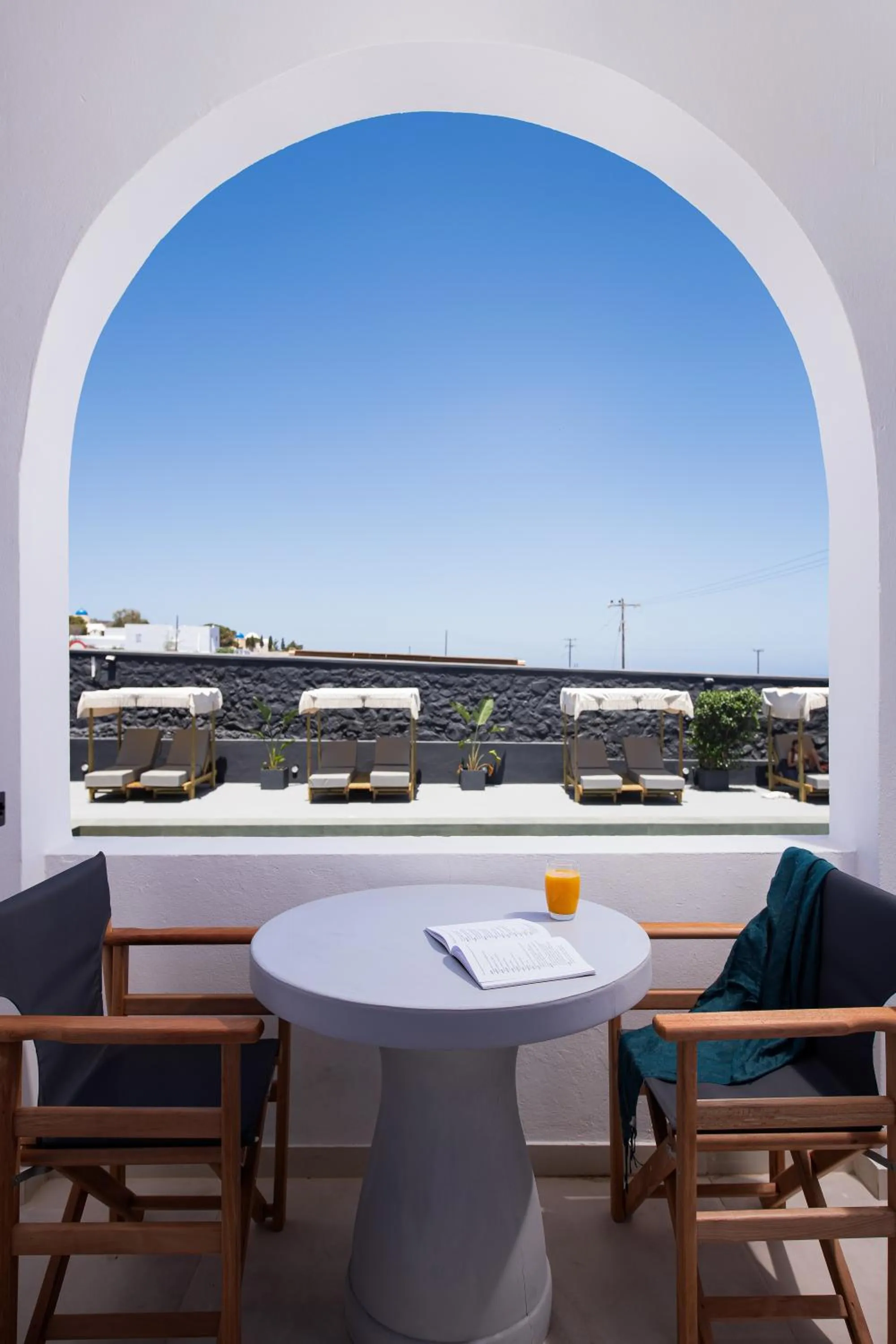 Pool view in The Noverian Bios Santorini