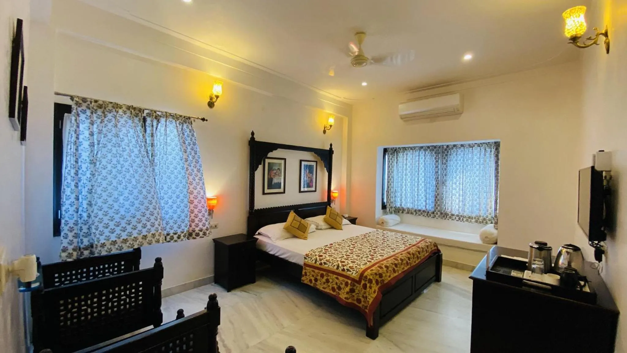 Seating area, Bed in Kotra Haveli A Boutique Hotel by Lake Pichola