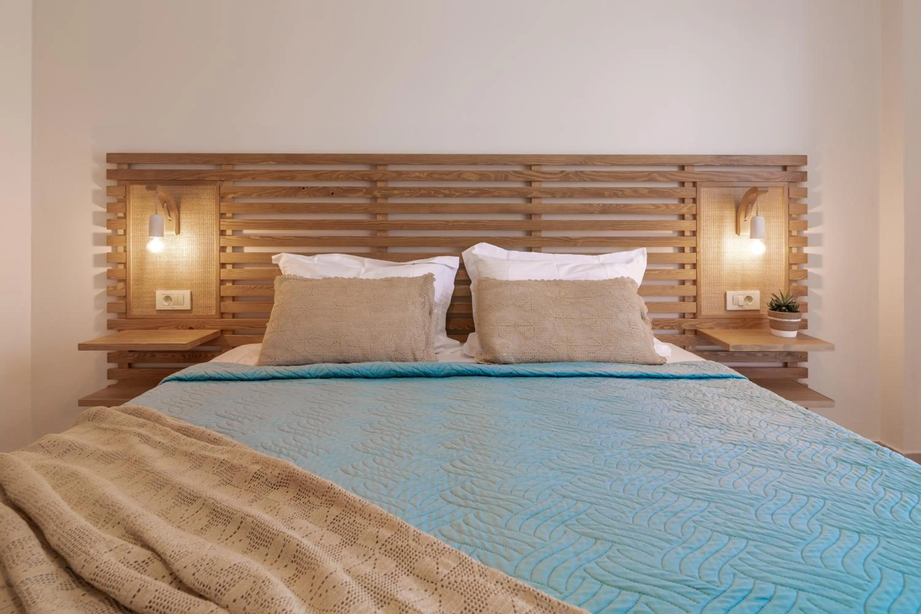 Bed in Sunset Apartments