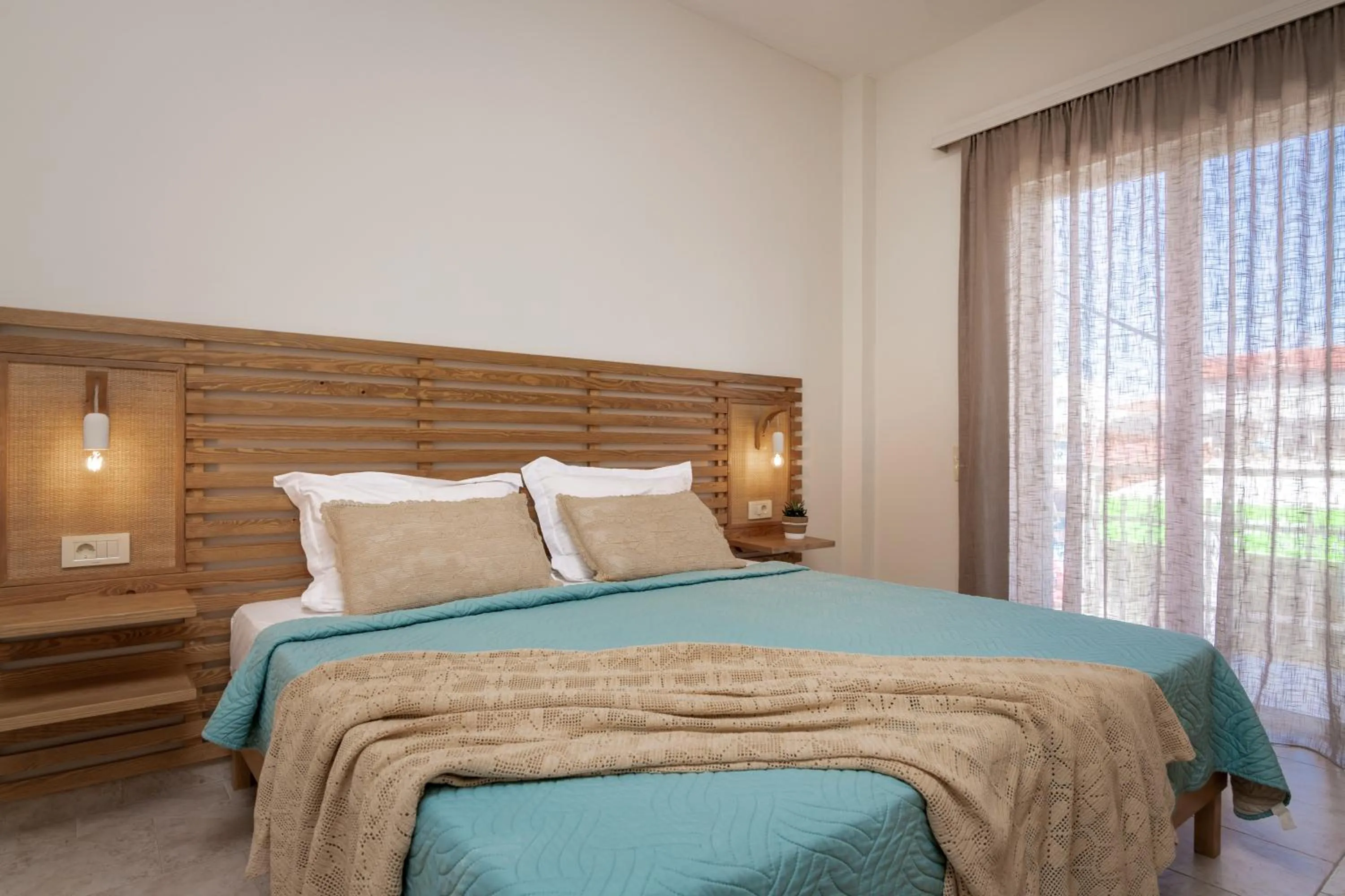 Bed in Sunset Apartments