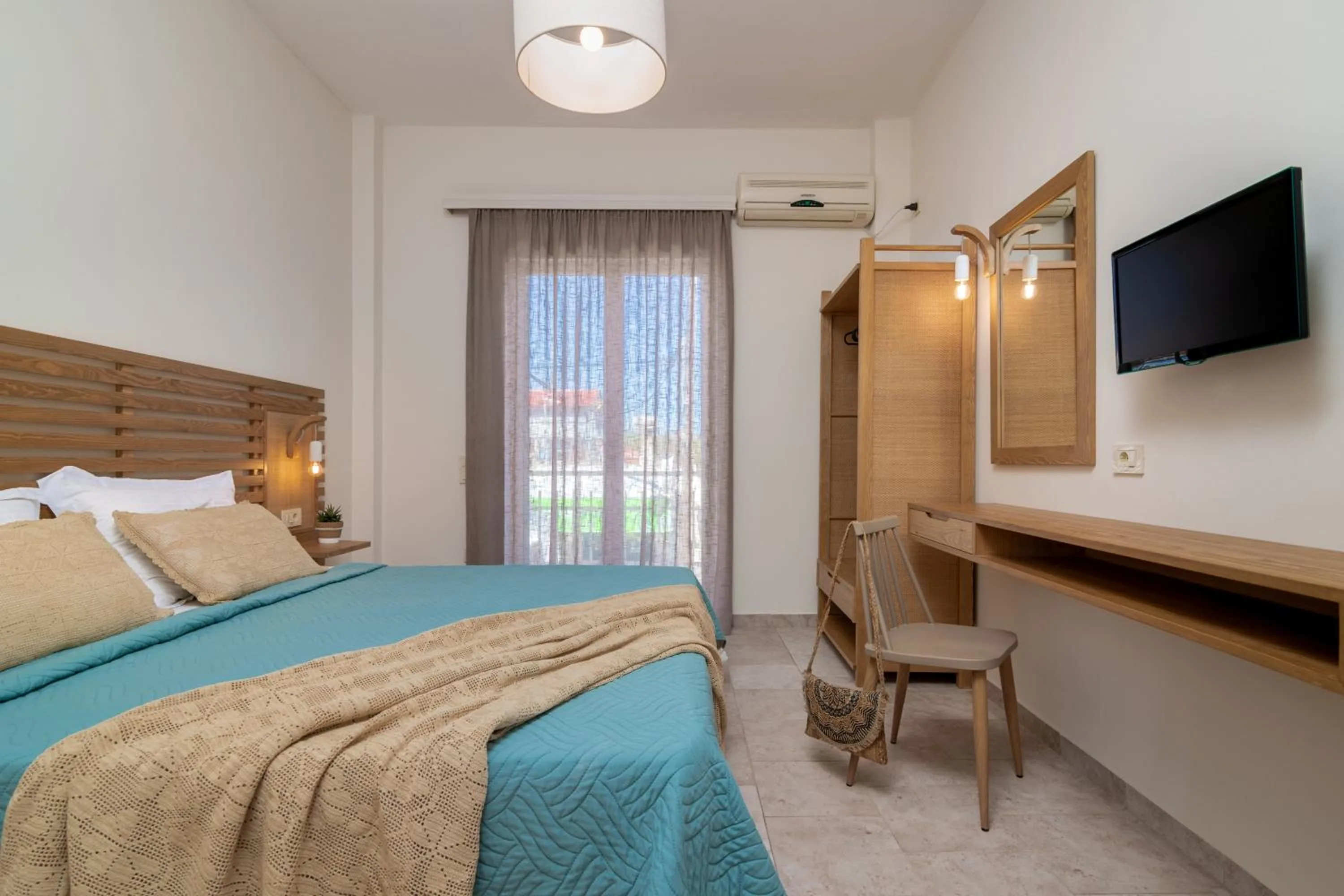 Bed in Sunset Apartments